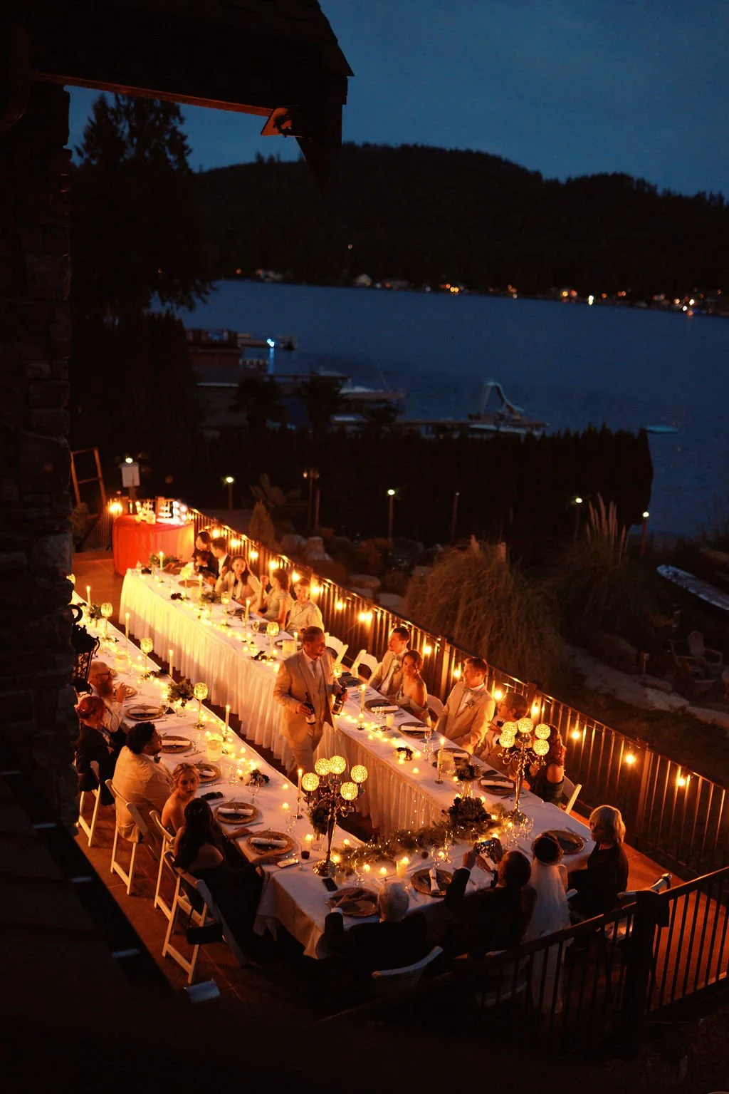 The Castle at Summit Lake outdoor wedding reception set up during late evening