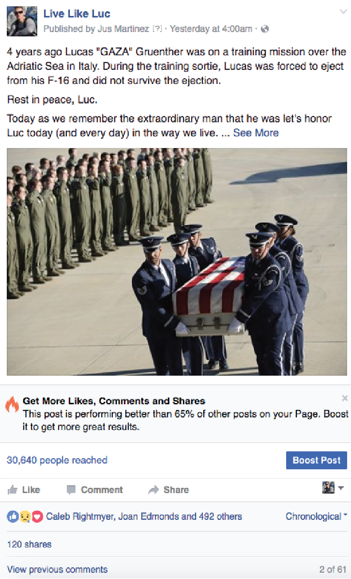 Military honor funeral ceremony with soldiers in uniform, carrying a casket draped with an American flag, at an outdoor military base or airport.