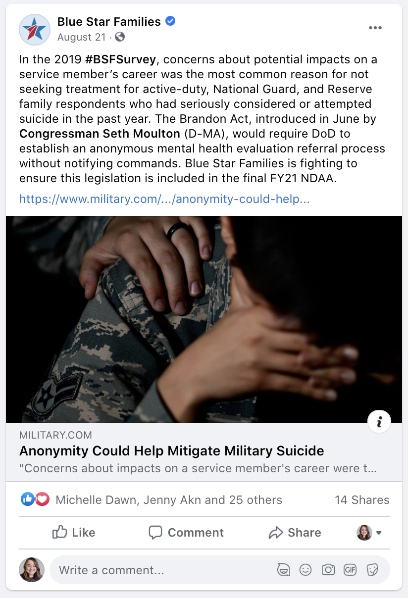 A soldier wearing camouflage uniform has their head bowed and covered with their hand, while another person gently touches their shoulder.