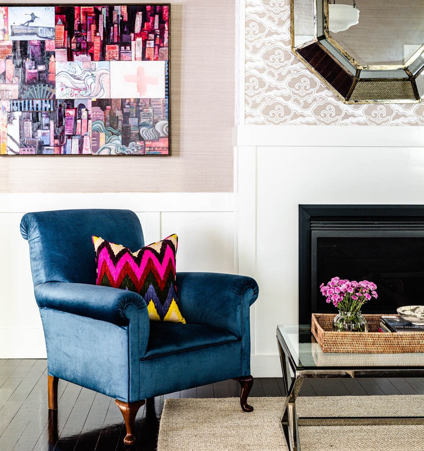 |Sitting Pretty | A new fireplace was a major element in transforming this room. It created a visual focus and really grounded the space. The patterned wallpaper was especially printed on exactly the same base cloth as the plain to ensure a perfect c