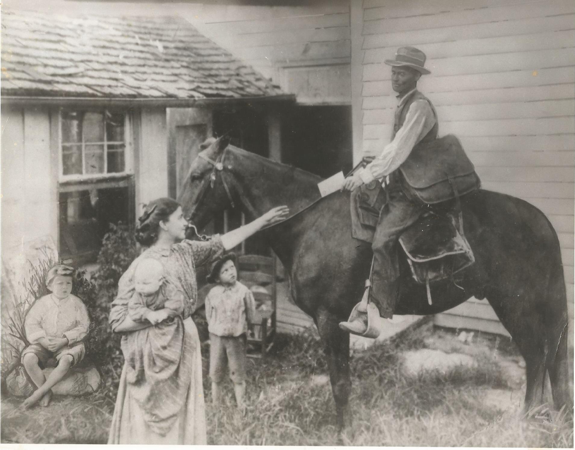 Grover Cleveland carrying mail on horseback. Pictured here with first wife Mae