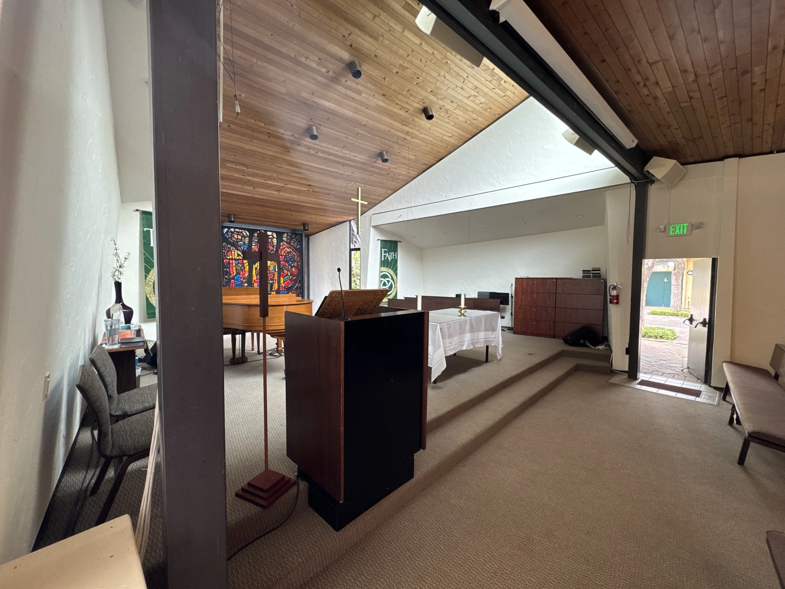 This is a better view of their chancel, with the stained glass wall in the back.