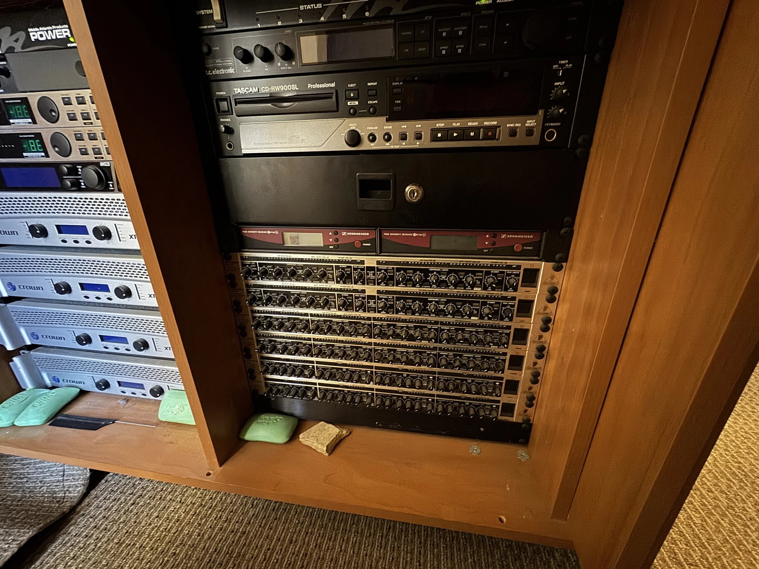 This collection of equipment gave the church lots of tools to improve sound quality...but dozens of knobs are easy to bump. And it's hard to train people to use equipment like this.