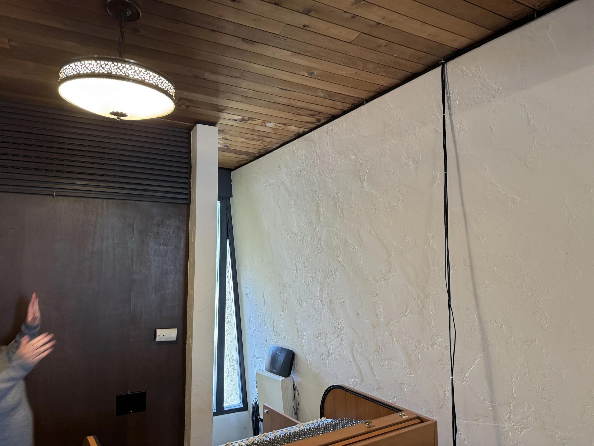 These cables are indicative of the problem. While some cabling is unavoidable, it was important to Malibu to improve visible wires like this...without a budget large enough to open up these slanted walls.