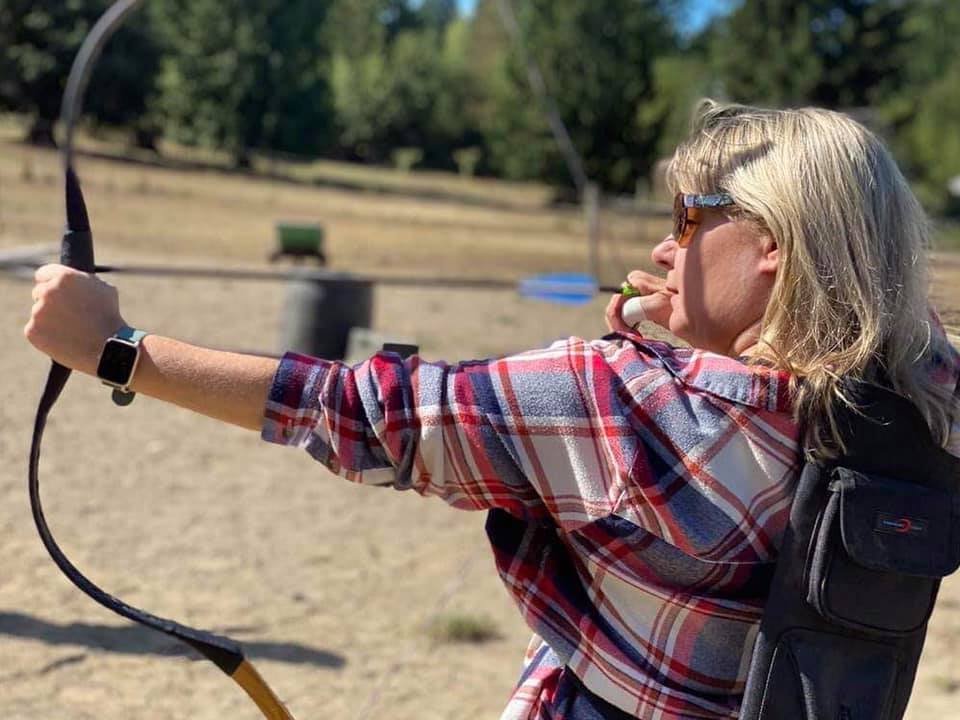 A client shoots during her private 2 person session