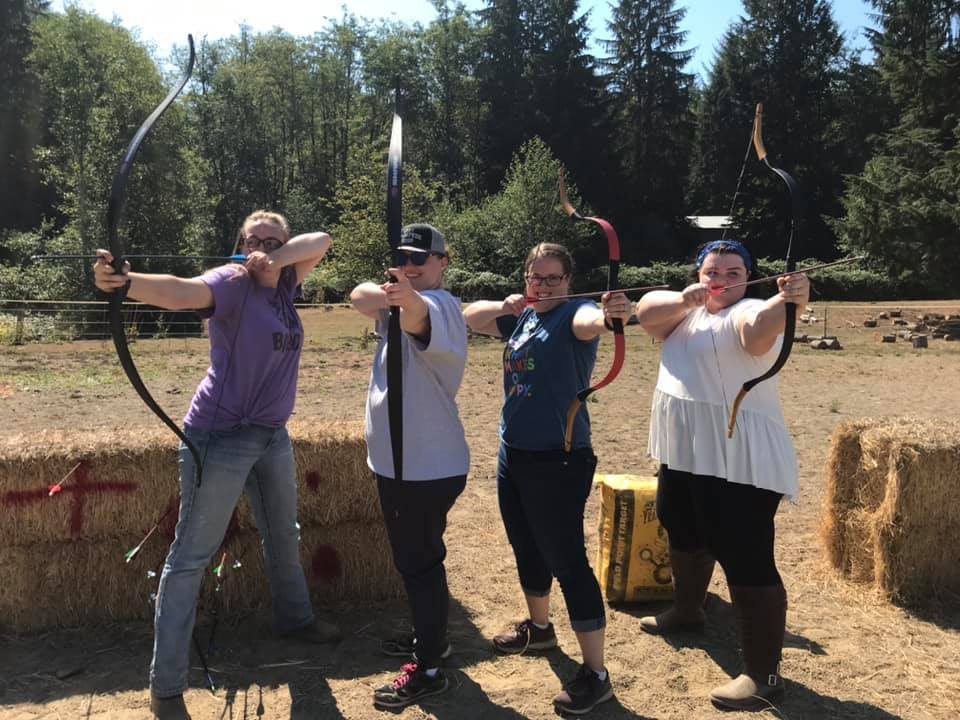 4 friends pose to celebrate after a private workshop