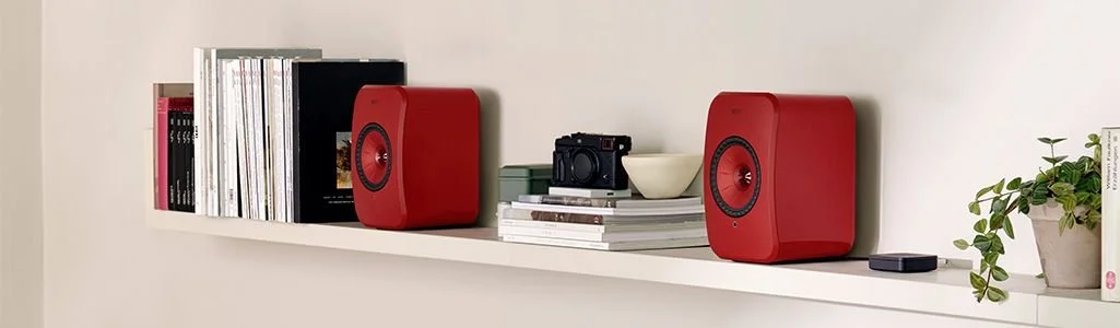 red-kef-bookself-speakers.jpeg