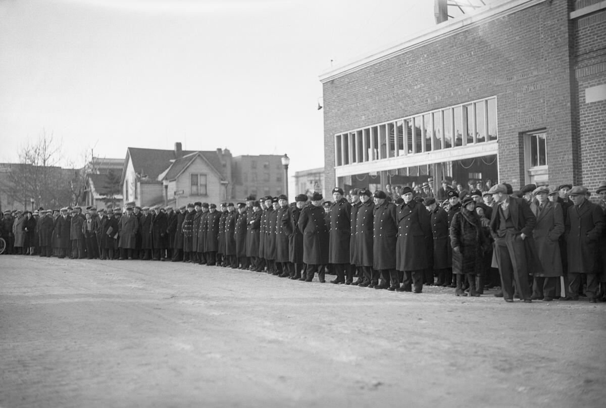  Edmonton Police Department constables lined 102nd Avenue, fronting the Marchers’ northern flank.   Glenbow Archives Photo No. NC-6-13014H  