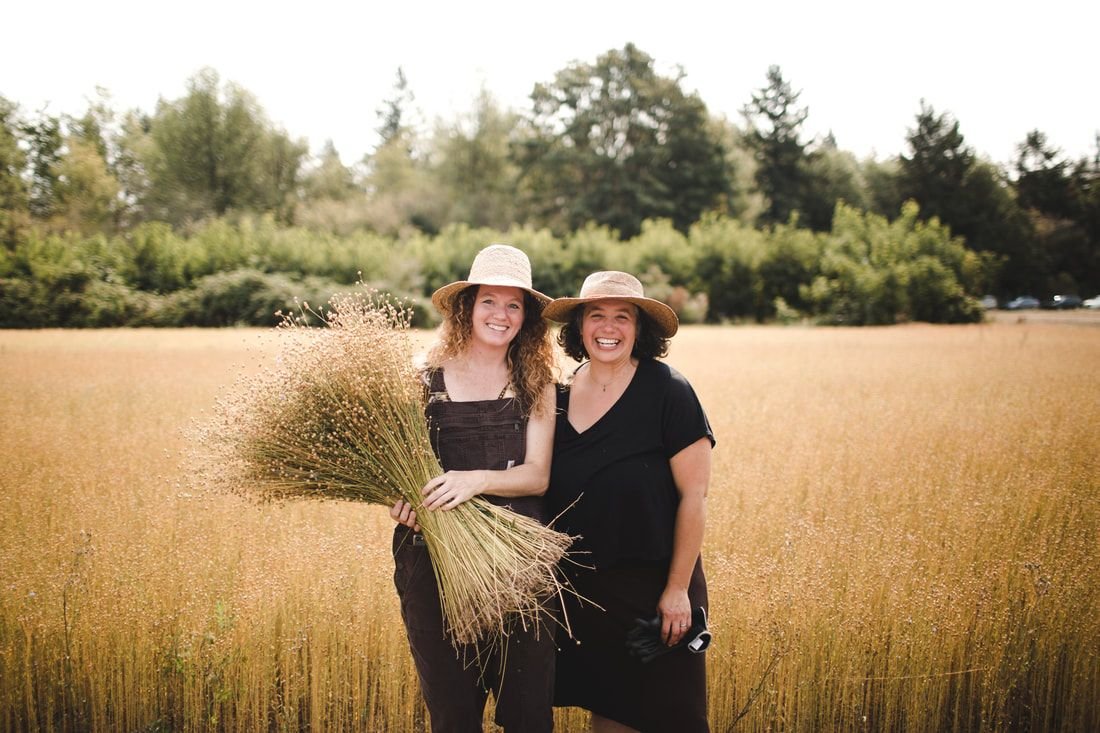 Shannon Welsh and Angela Wartes-Kahl with their 2017 flax crop at harvest time. Photograph by Micah Fisch.jpeg