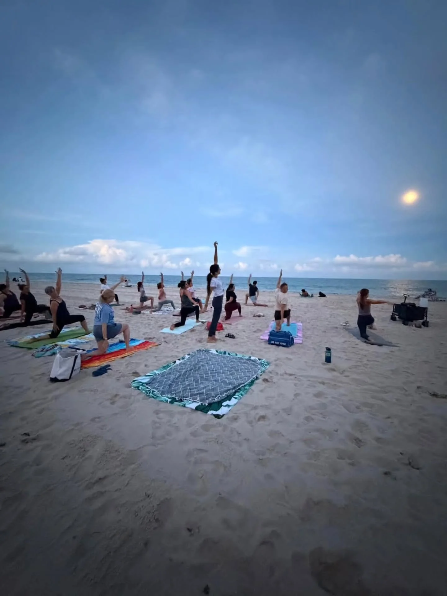 Full Moon Beach Yoga with Diana tonight 🌕🌊✨
.
.
Beneath the rising moon and the rhythm of the waves, we gather to breathe, stretch, and release what no longer belongs to us. 
.
.
Let the ocean hold you, the moonlight guide you, and your breath brin