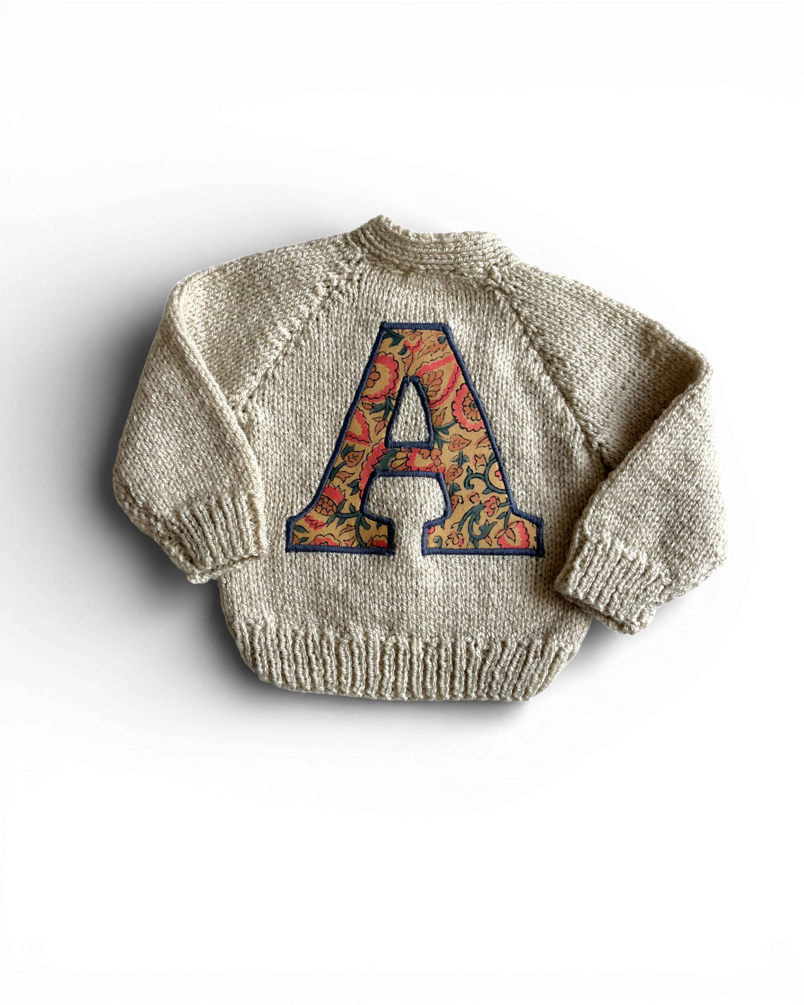 A initial Beige hand knitted cardigan 0-3 months