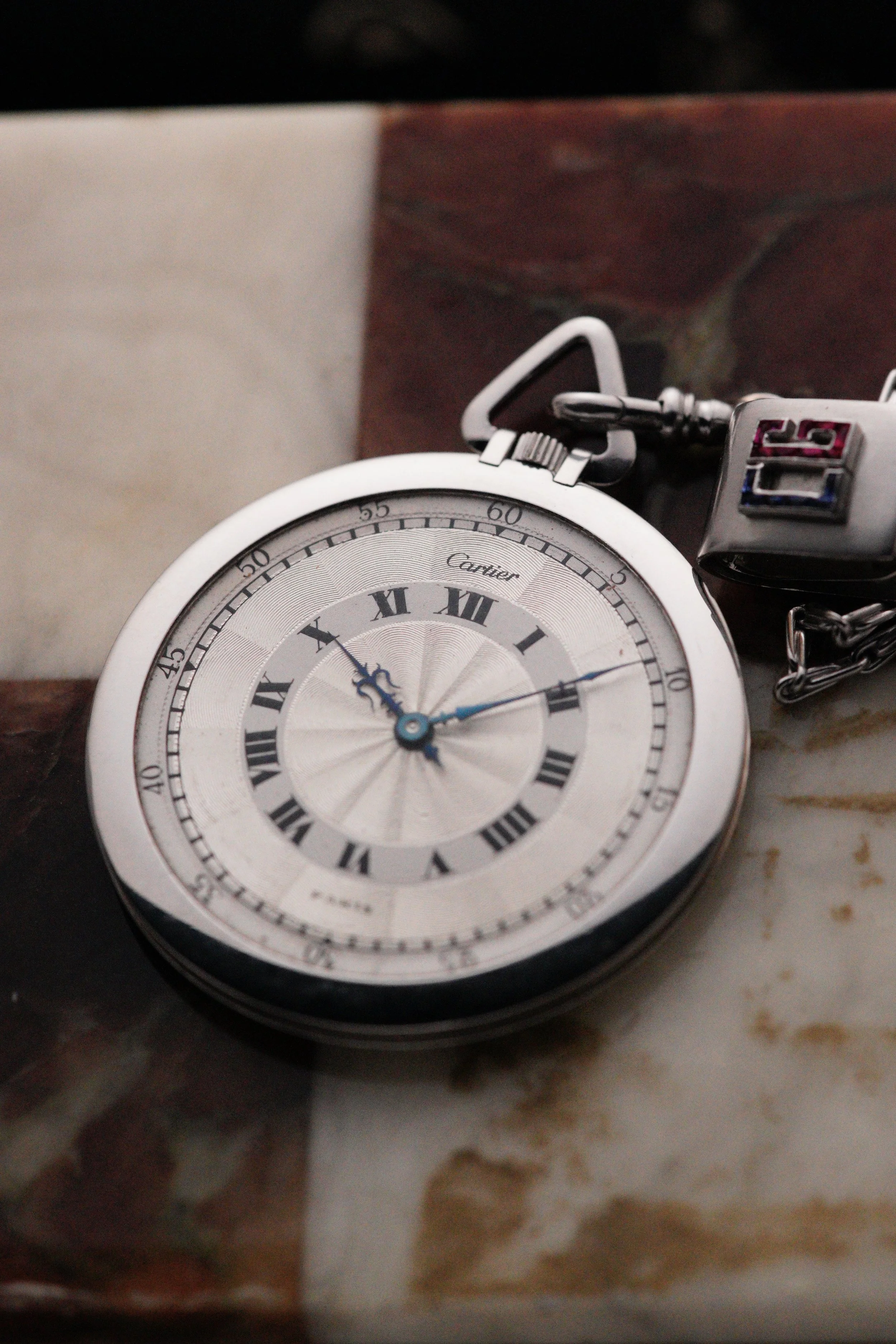 Cartier pocket watch, enamelled CG initials on the casebook