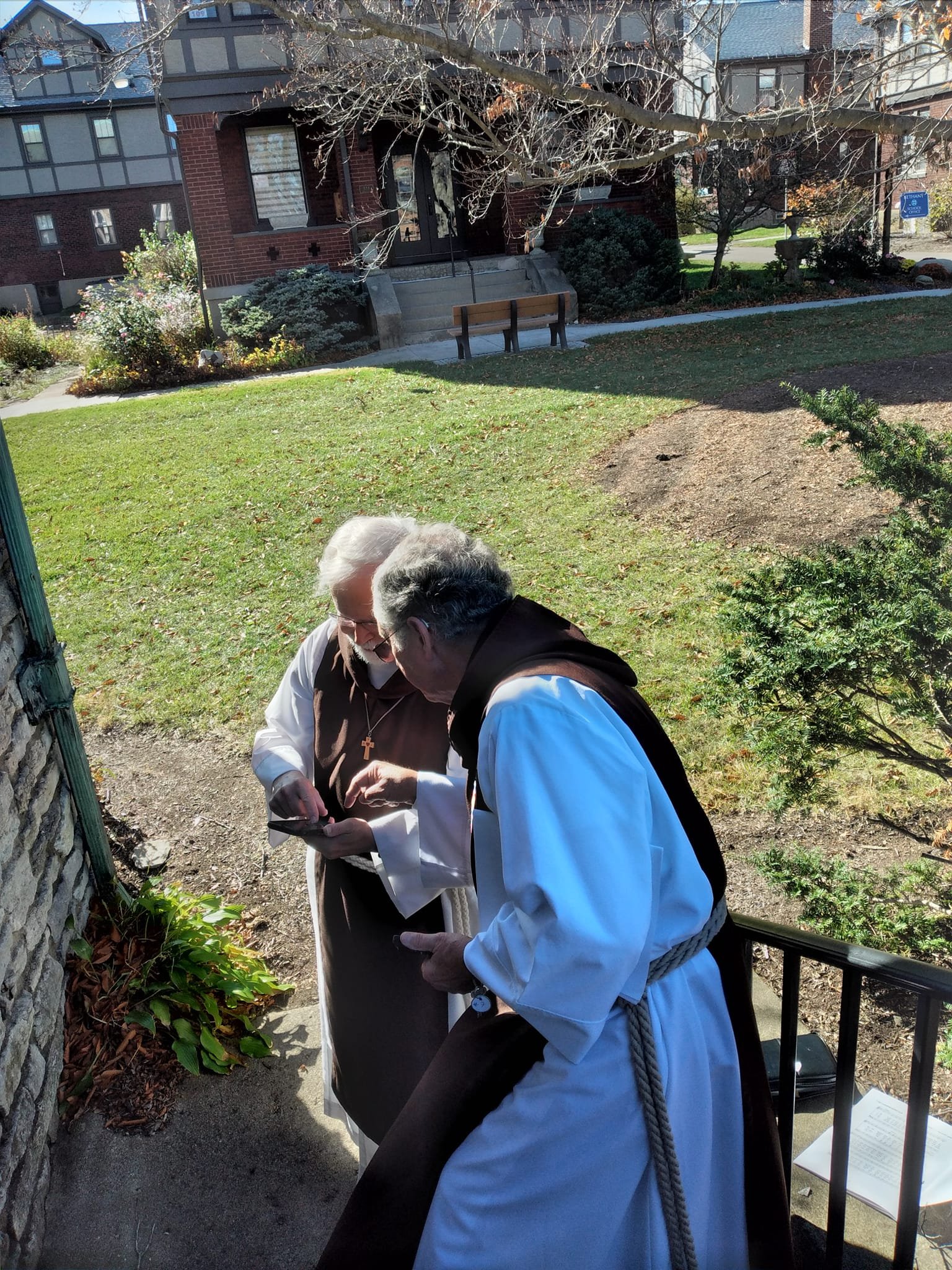 Brothers checking a map to find the cafeteria
