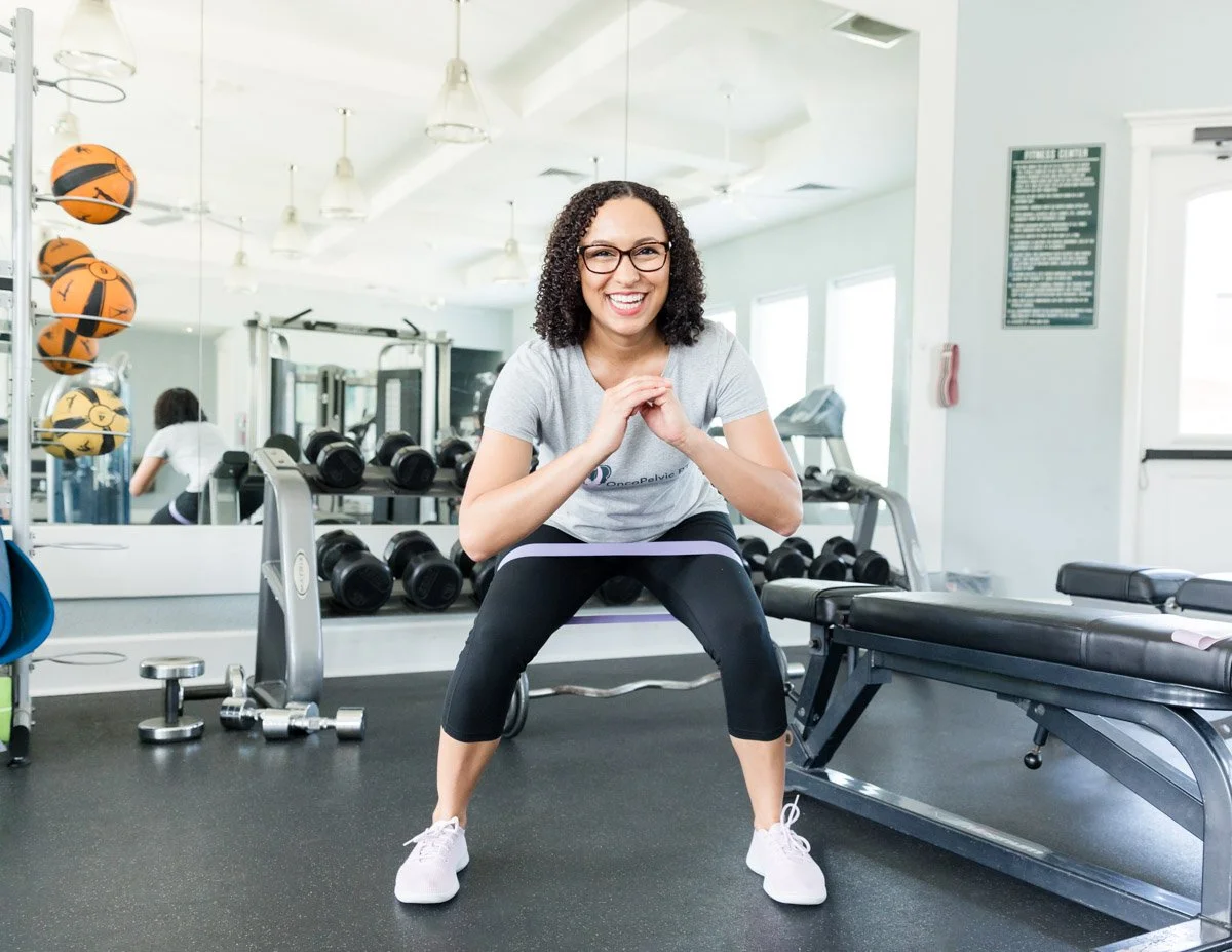 Dr Alex Hill, PT, DPT exercising at a gym, smiling