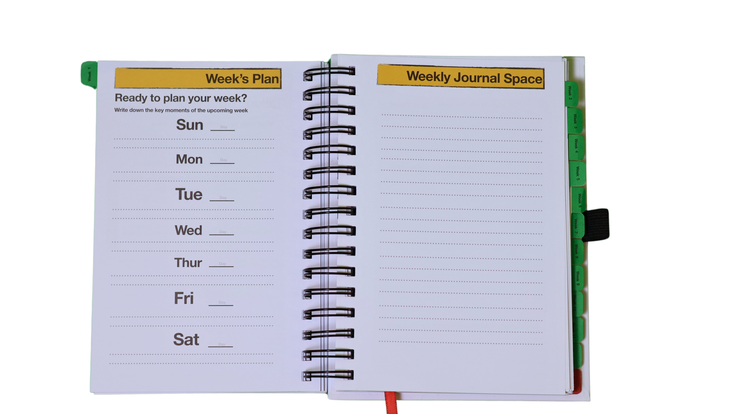 Open spiral planner with weekly schedule pages, tabs labeled for each day of the week, and headings for weekly plan and journal space.