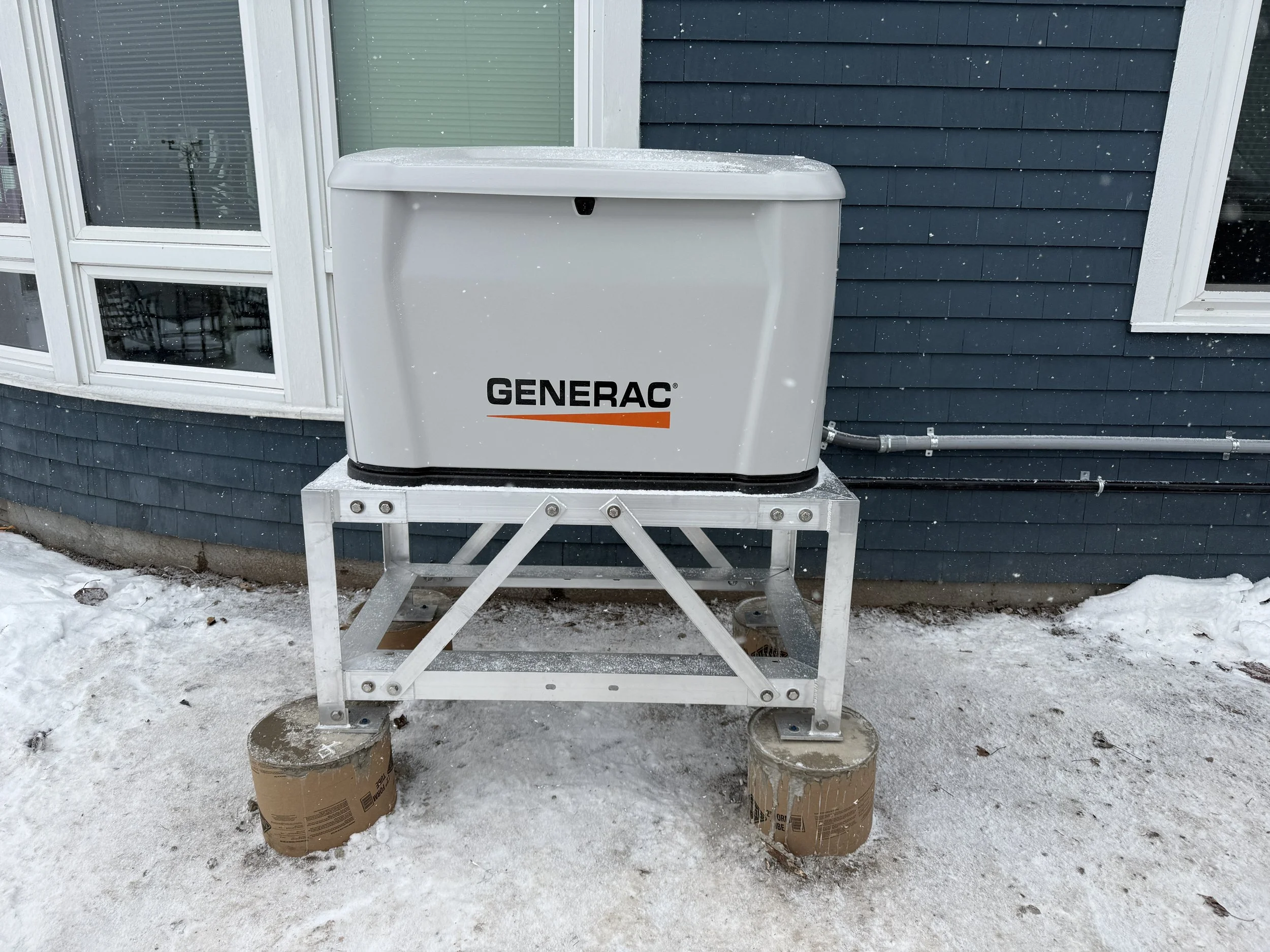 A Generac residential standby generator installed by Tri-Star Electric's licensed electricians in Sodus Point New York.