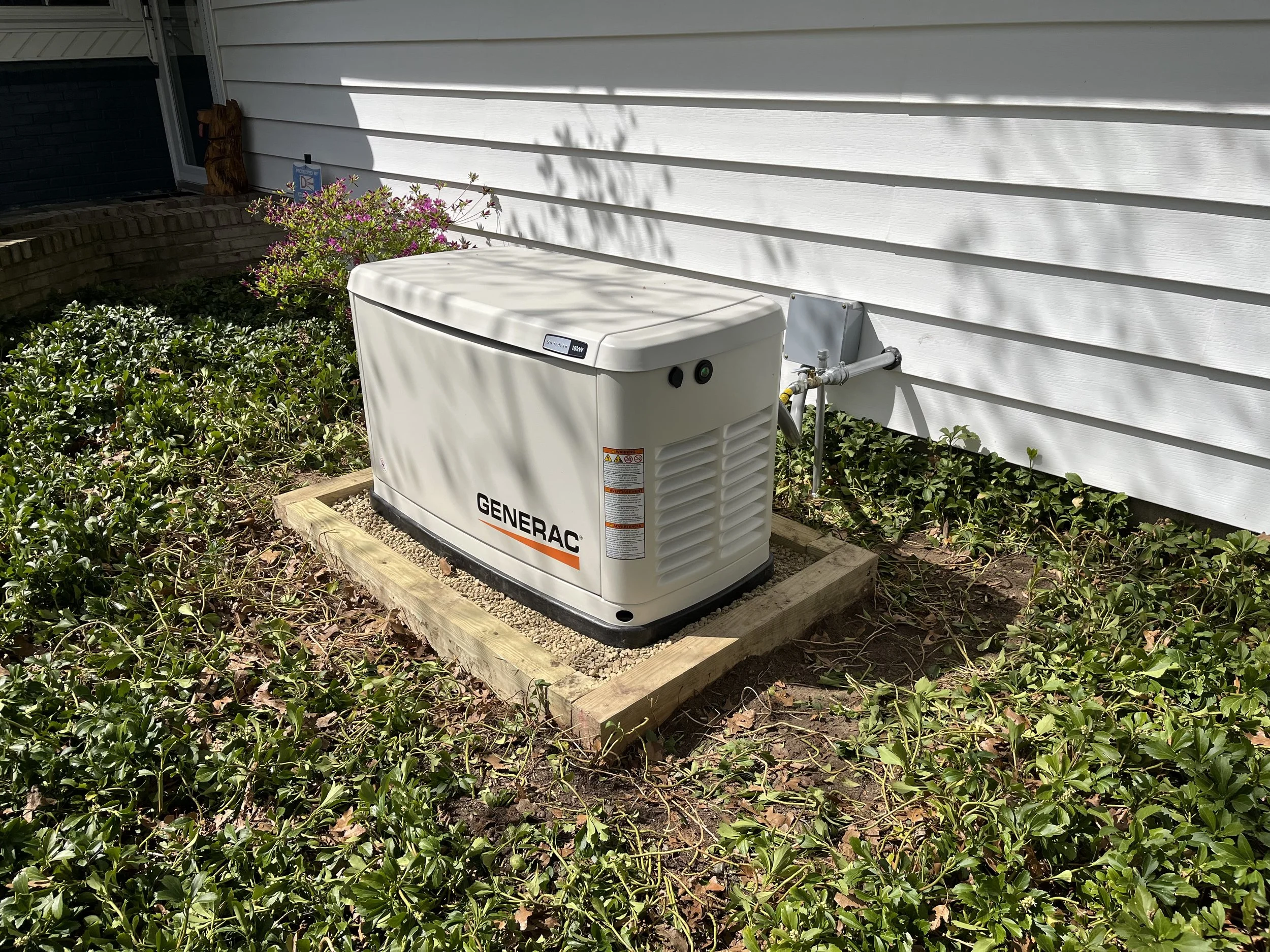 A Generac residential standby generator installed by Tri-Star Electric at a home in Pittsford, New York.