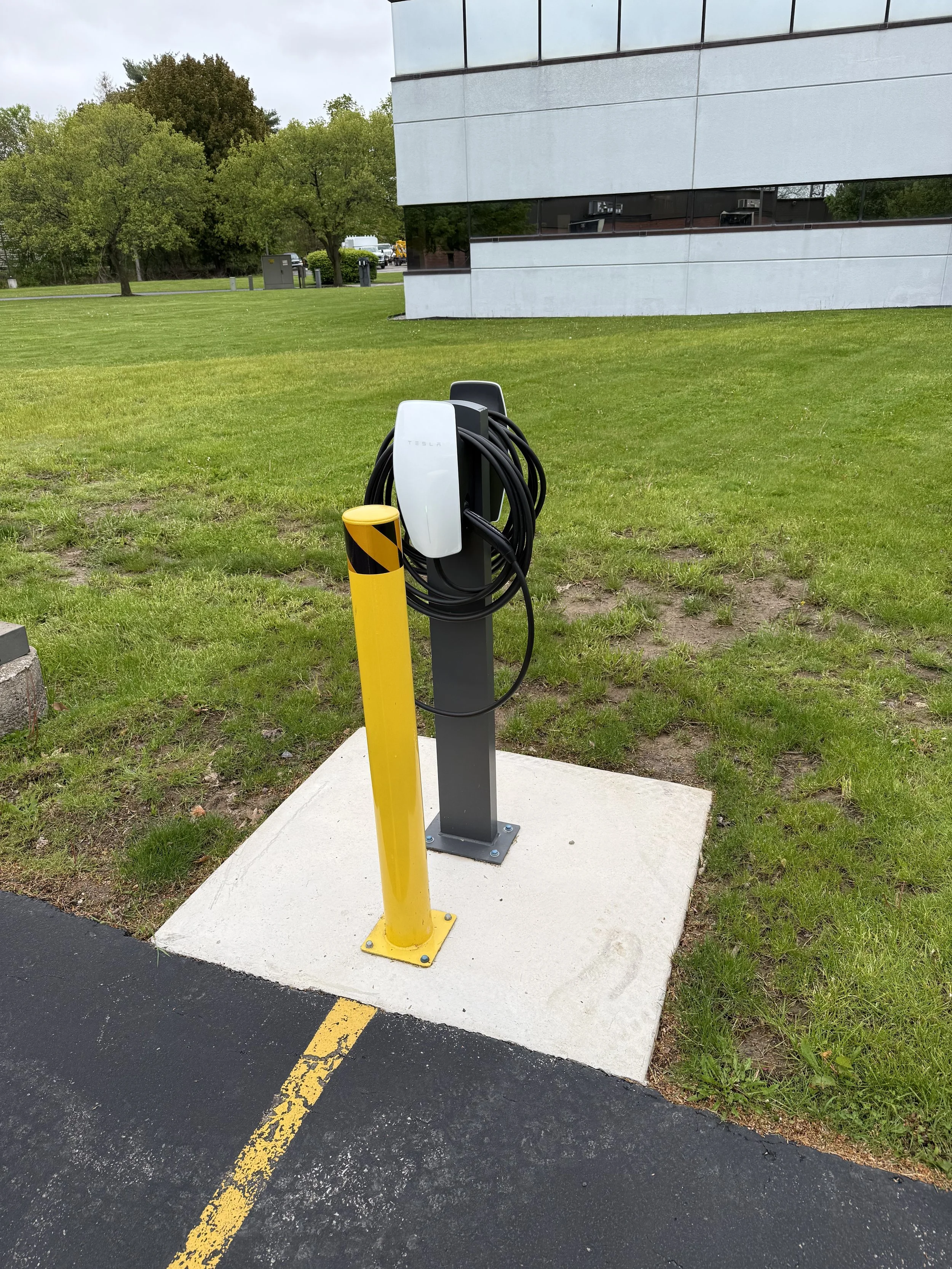 Tesla dual port level 2 electric vehicle charging station installed by Tri-Star Electric in Victor, New York