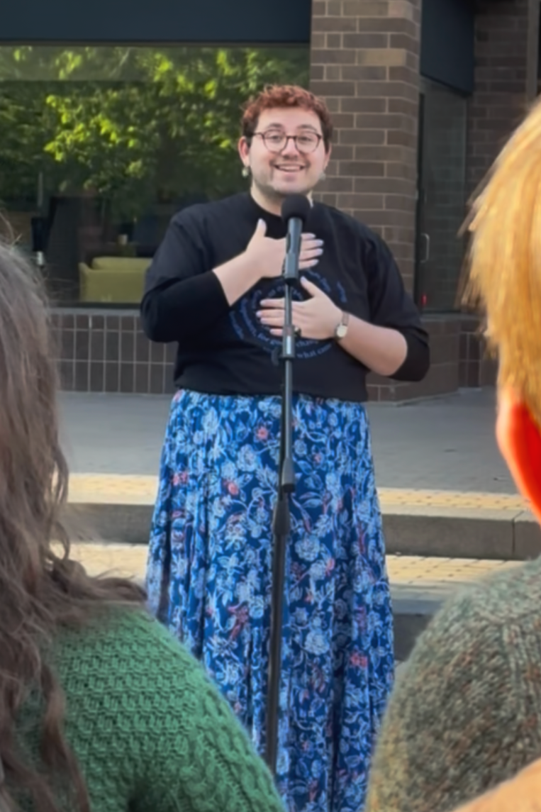 Singing Resistance Iowa City Song Vigil May Day 2026. Photo by Brennen Malone.