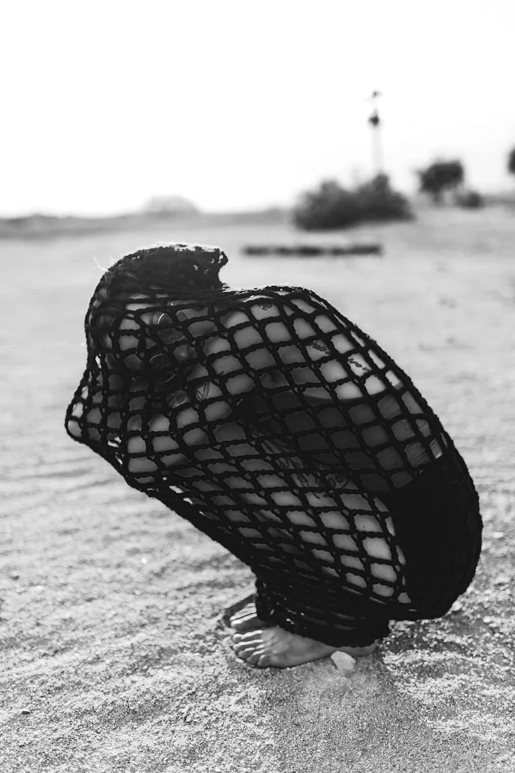 jazzy wrapped in a crochet cocoon in the desert