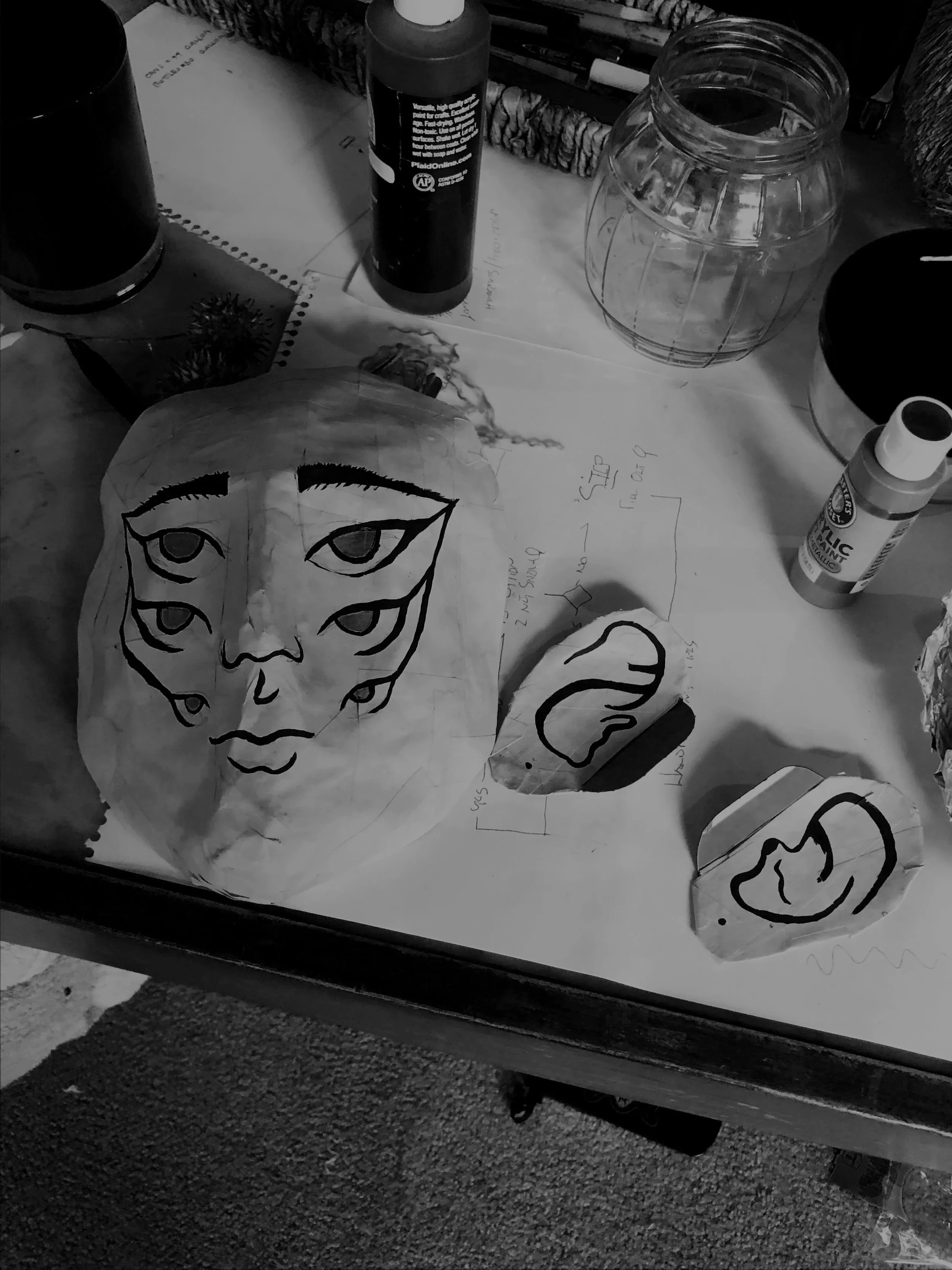 Paper mask and ears on a table