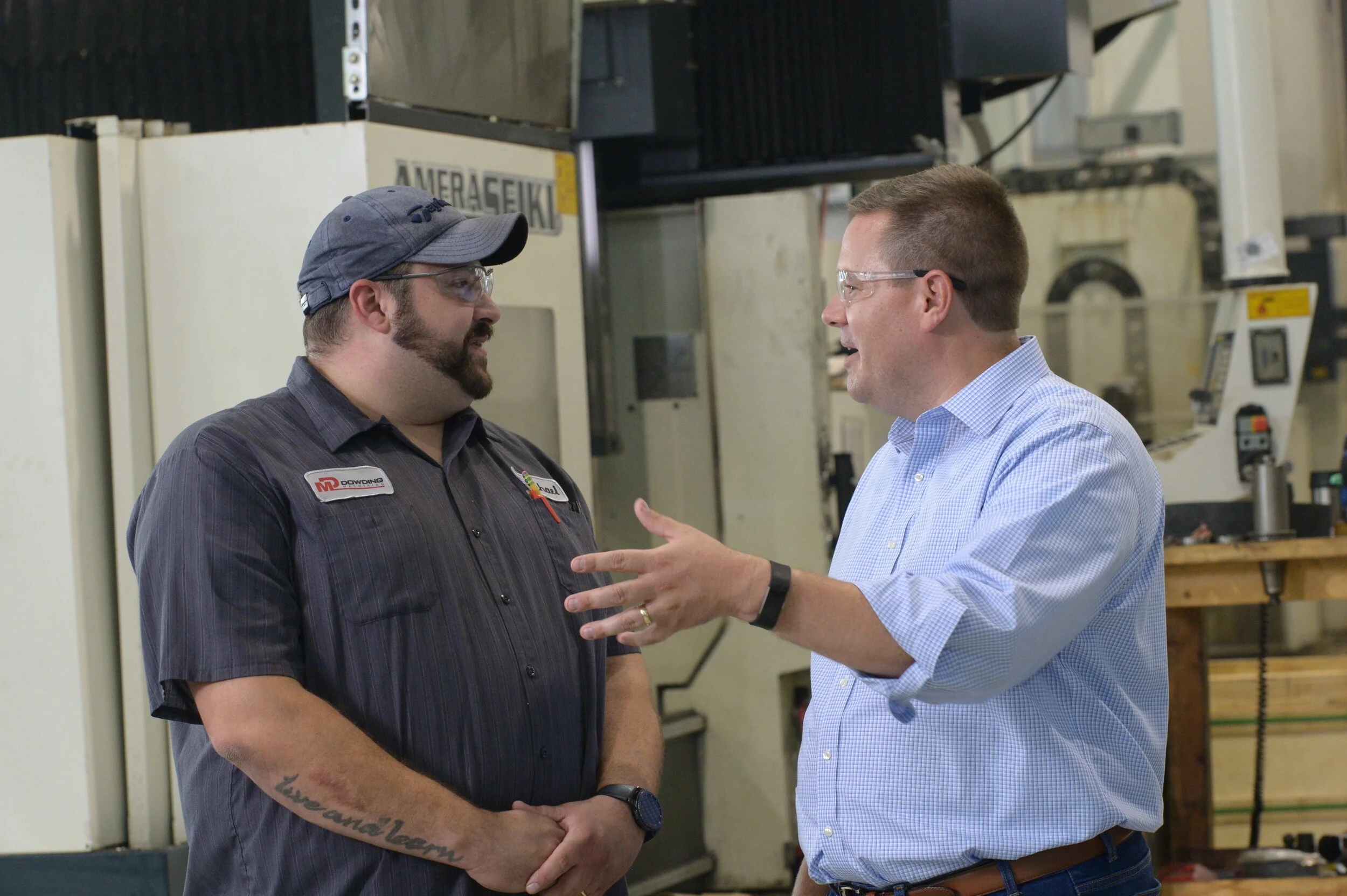 Doug Tietz speaking with business leader