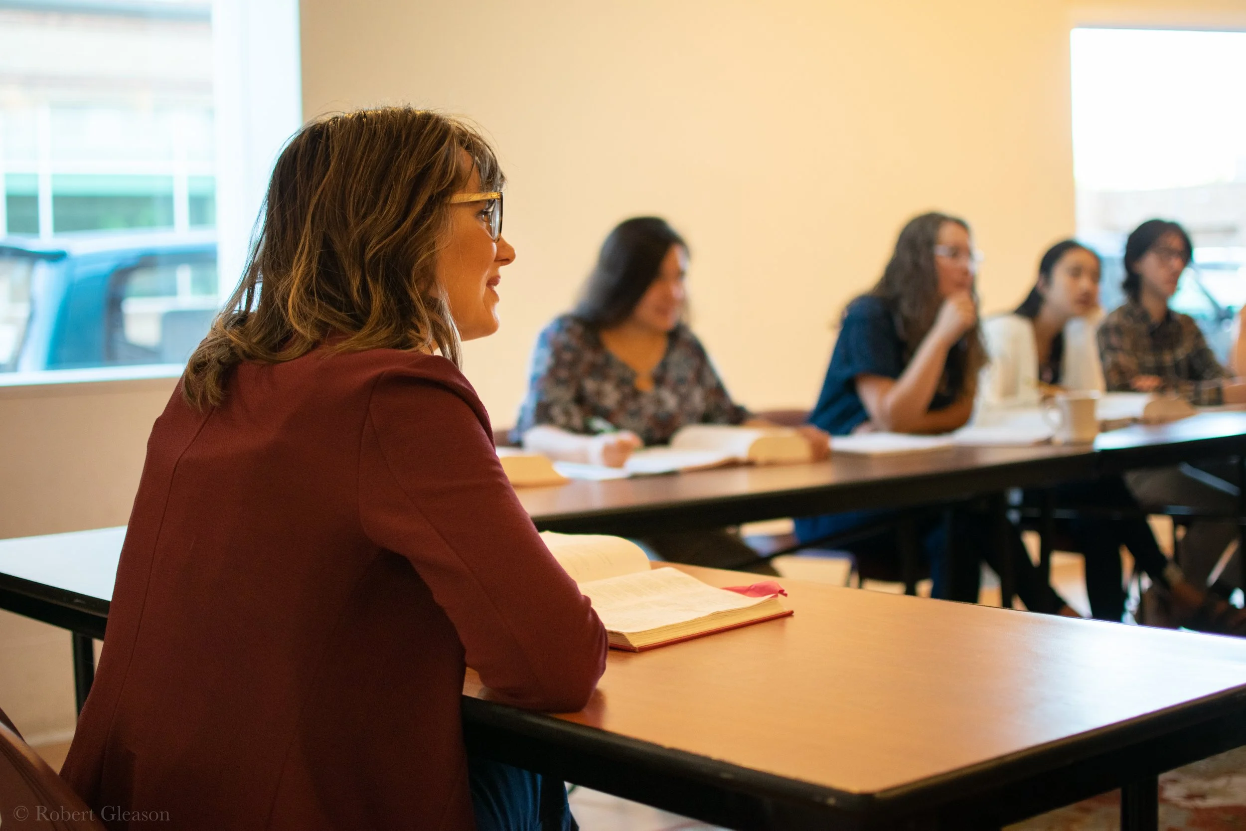 College teacher in class