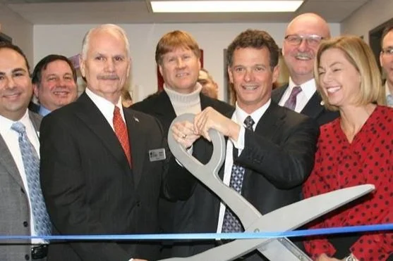 Trott ribbon cut.jpg