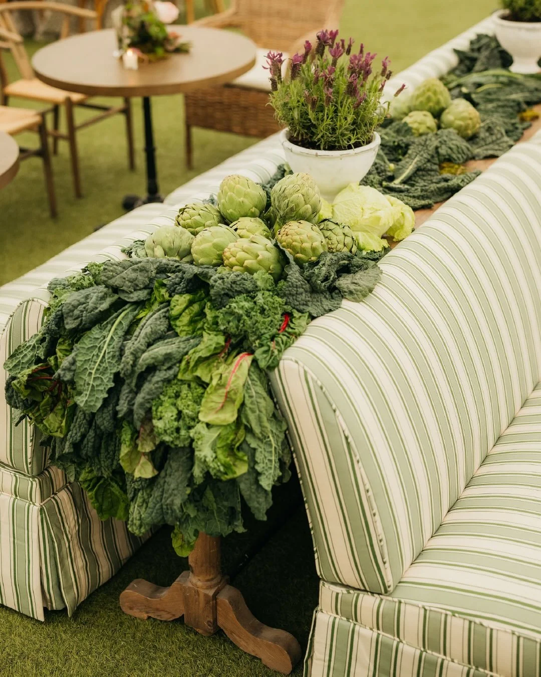 @givingtreeacres&rsquo; third annual spring fundraiser featuring layered lush market greens, a softened color palette, and entrance archways draped in dramatic, leafy produce (carrots included). Unexpected guests wandered through, while hands-on mome