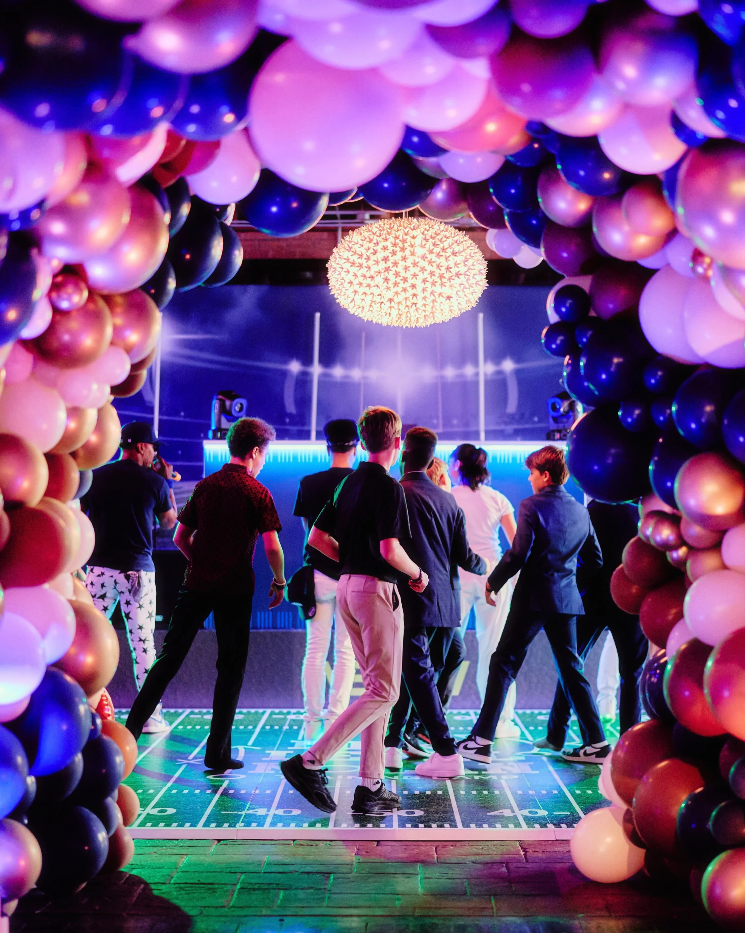 Welcome to training camp, where the full team gathered to celebrate Nolan&rsquo;s Bar Mitzvah. 🏈

No detail was spared&mdash;from custom monograms (aka NB&rsquo;s logo) and larger-than-life footballs anchoring the tunnel to arcade games, bowling, a 