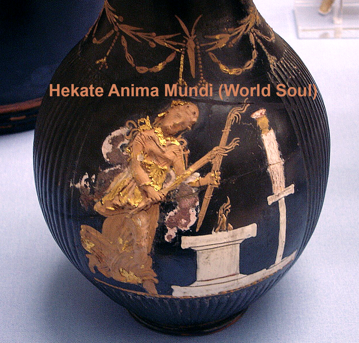 beautiful relief of Hekate holding torches in front of an altar on an oinochoe wine jug with laurel wreath decoration, about 350-300 BCE, Capua, Italy.