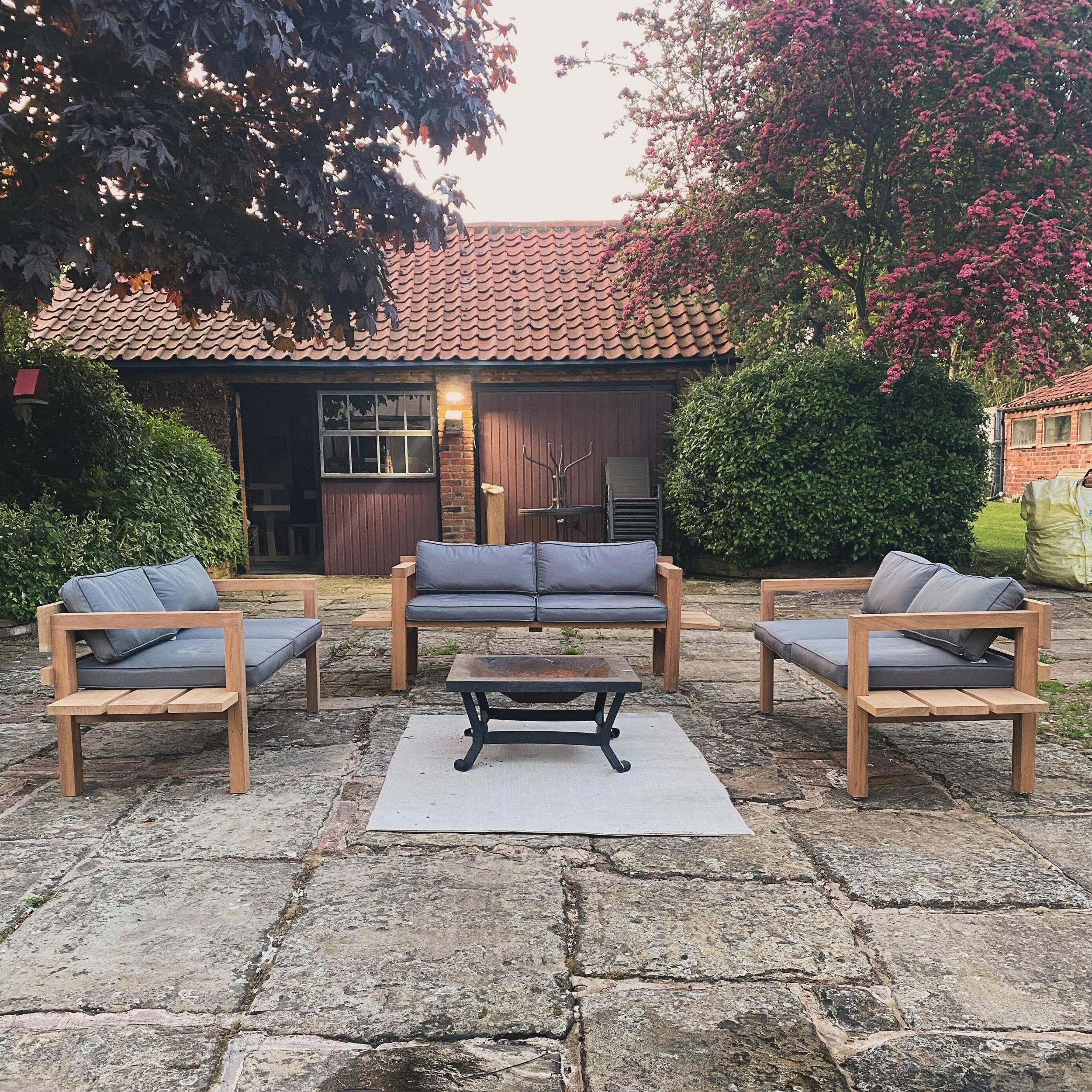 Too early for summer seating&hellip;? We don&rsquo;t think so! 

This is a preview of our new Penryn outdoor sofa, made in solid iroko with beautiful grey outdoor cushions. Ideal for the great British summer, no matter what it brings!

This set is de