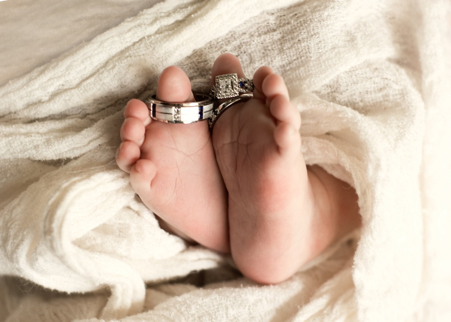 Newborn Photo with Wedding Rings