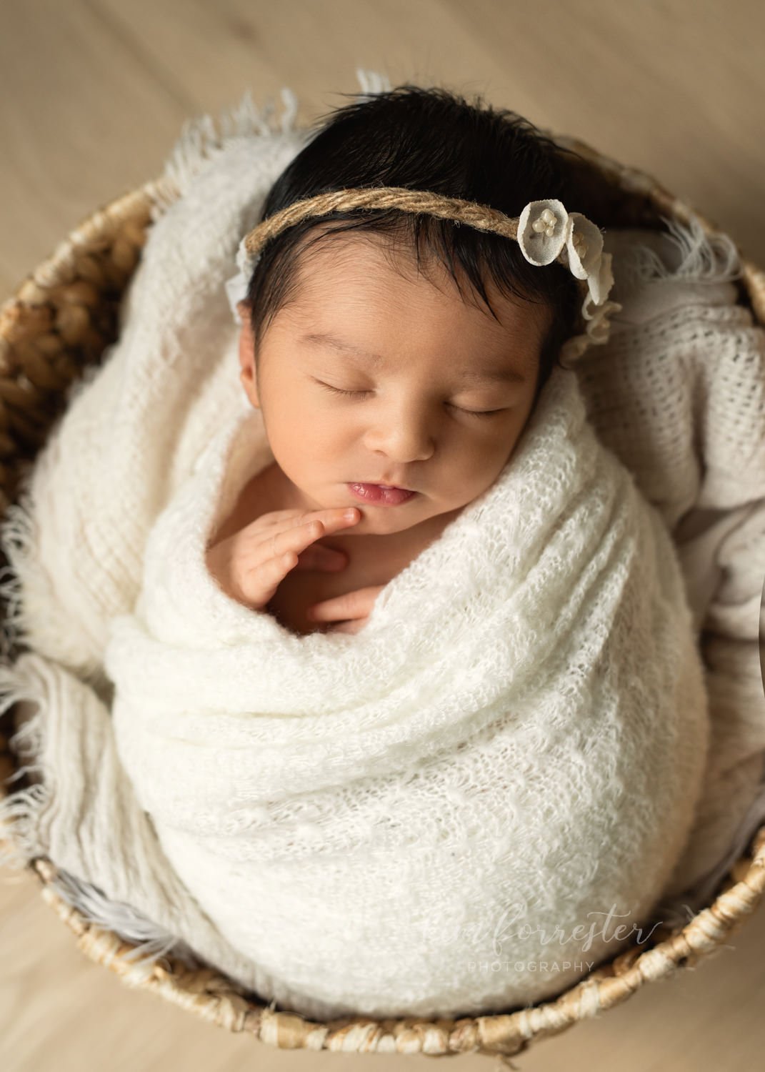 Basket-Posed Newborn Baby