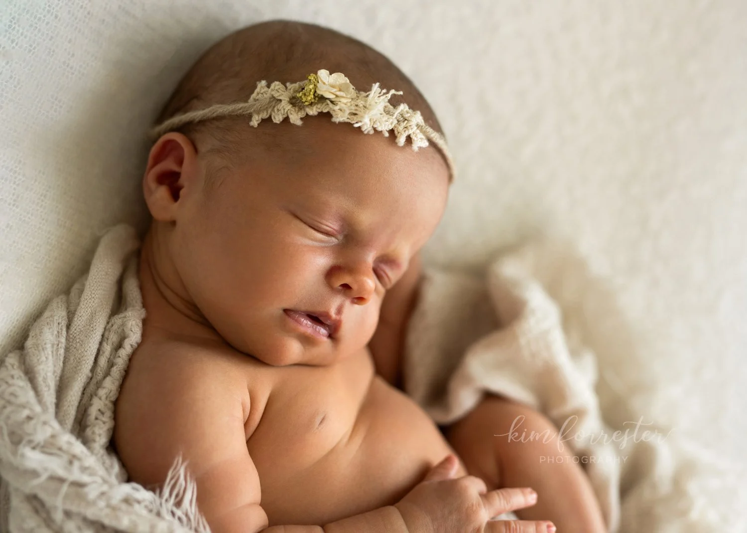 Newborn Girl Wearing Floral Headband