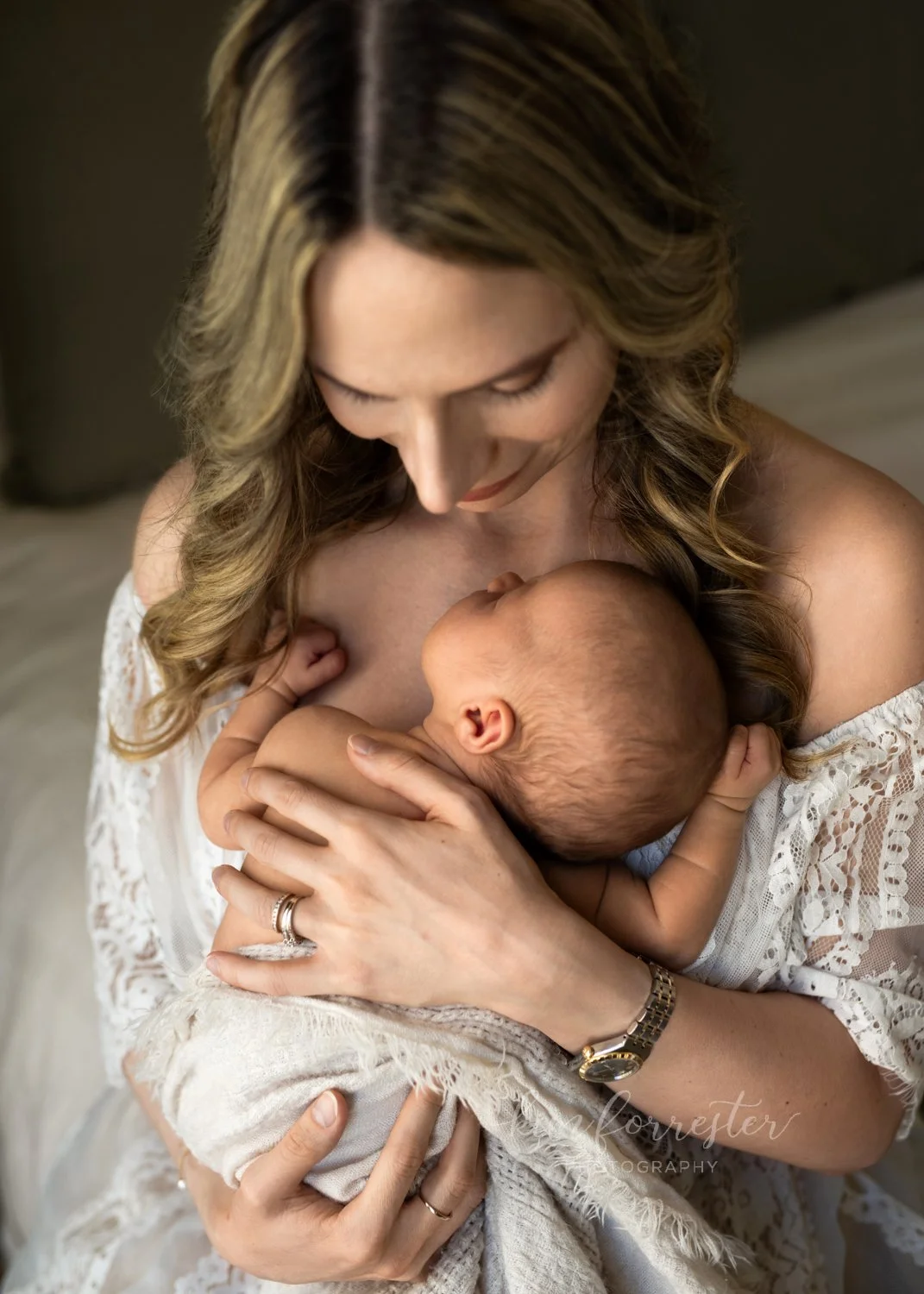 Mom Holding New Baby