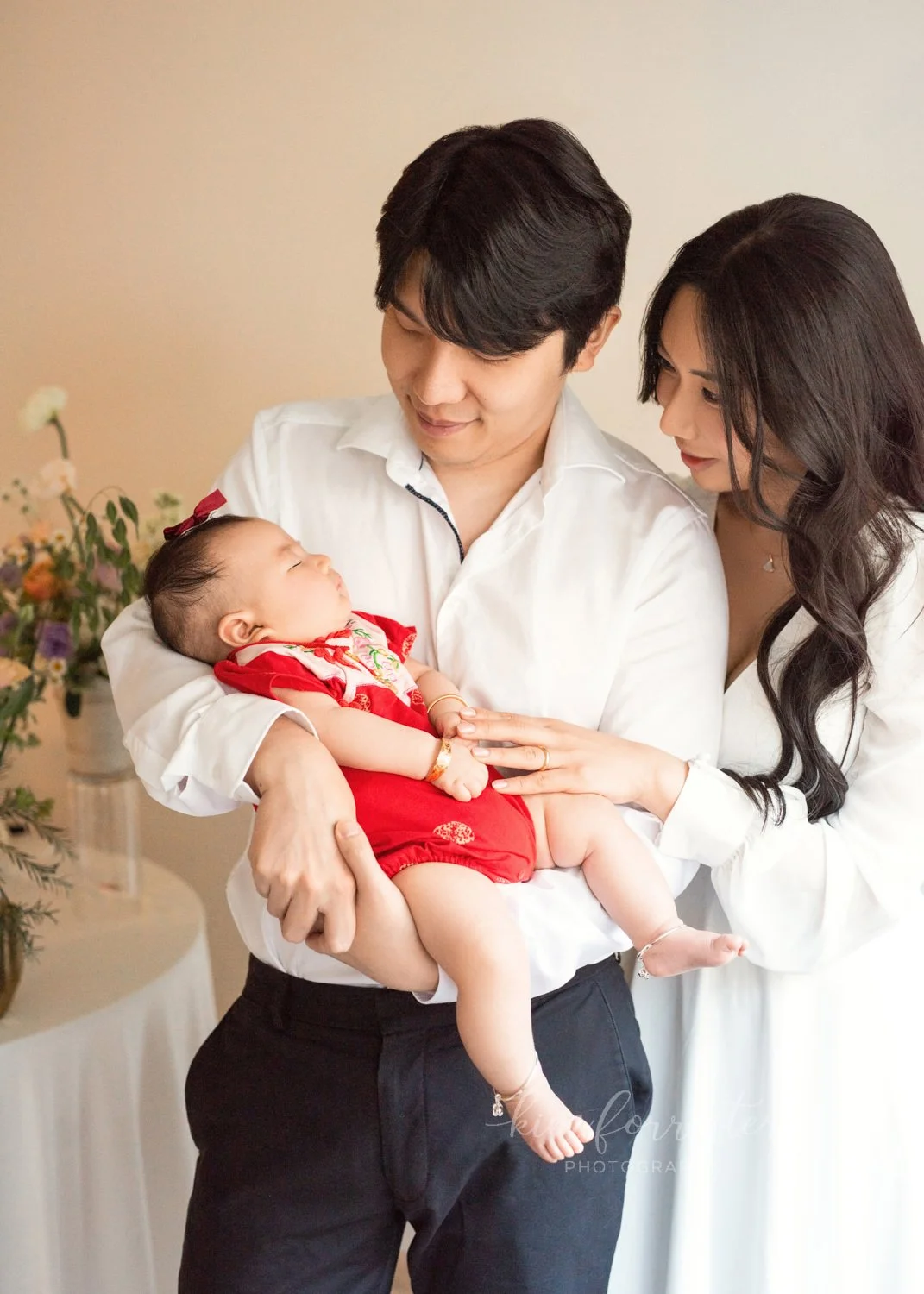 100-Day Baby Wearing Red