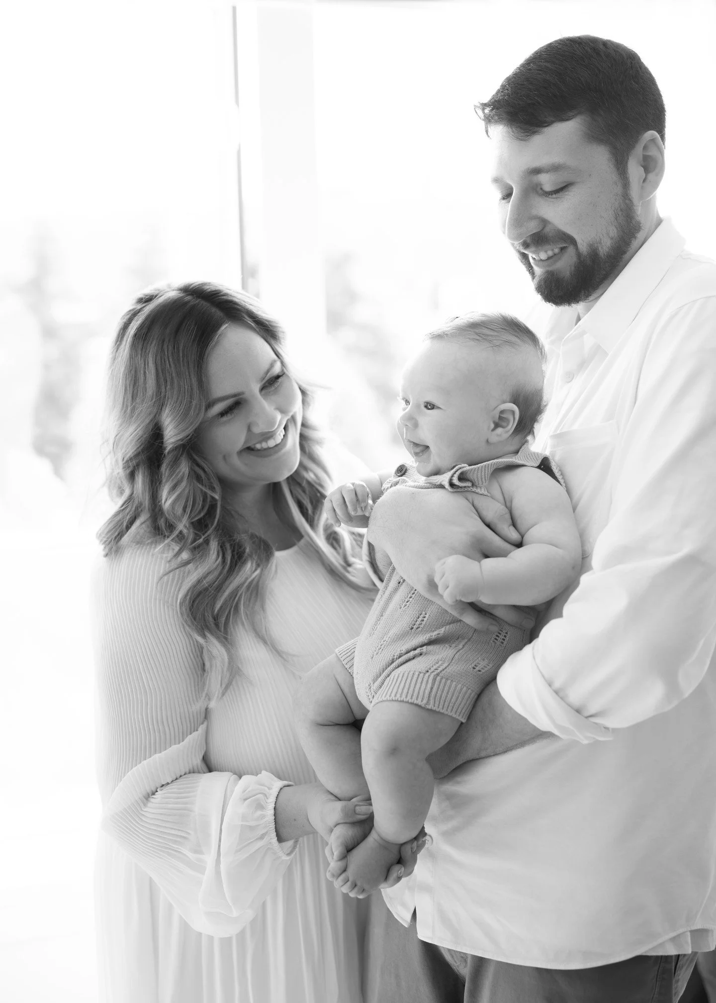These smiles say it all #LoveMadeVisible
-
#NewbornLove #FamilyJoy #FamilyBond #BlackAndWhiteNewborn #ClassicNewbornPhotography #InHomeNewbornSession #OkanaganNewbornPhotographer