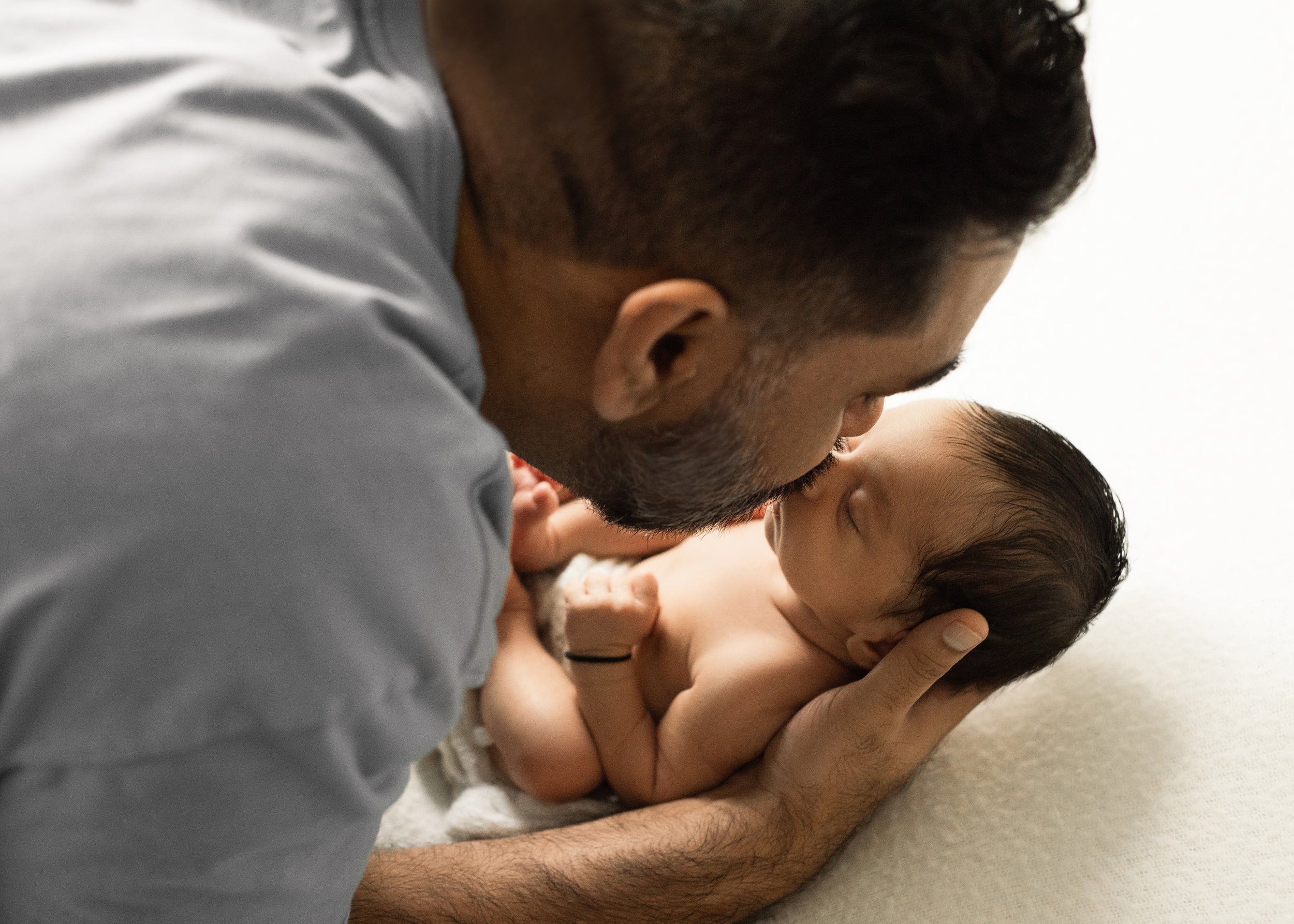 Dad and Newborn Nose Kiss