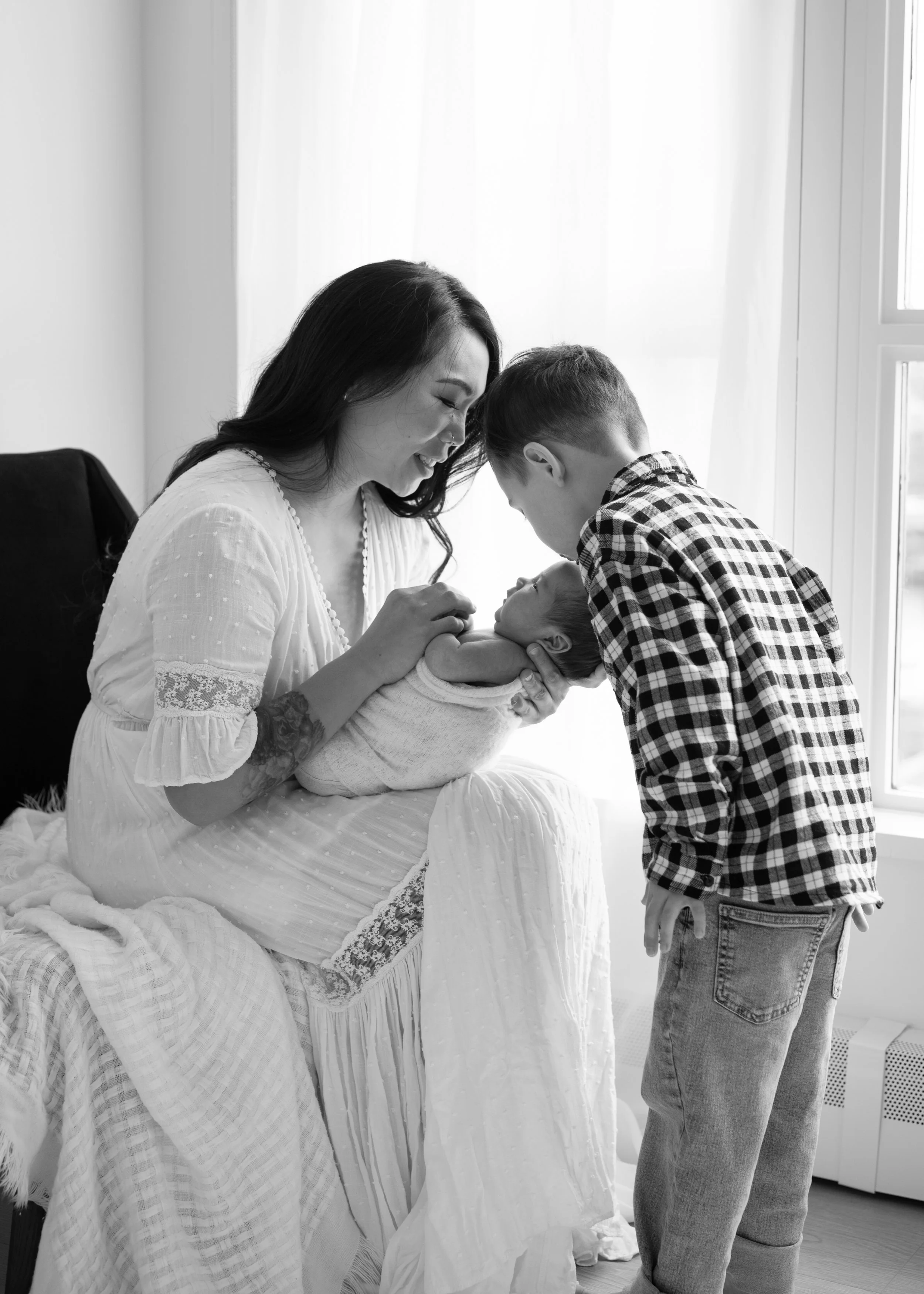 Newborn with Sibling in Nursery