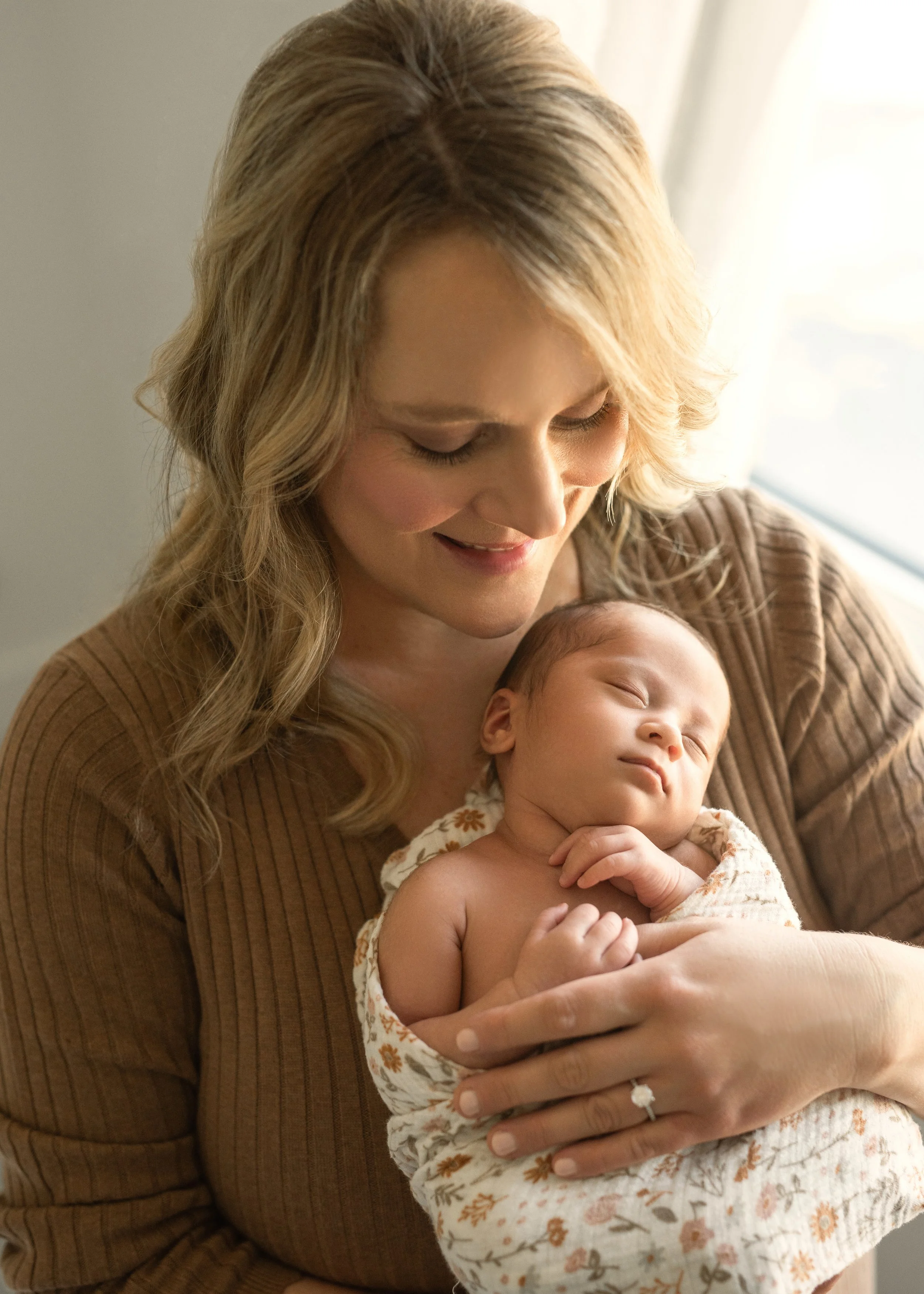 Mom Holding Newborn Baby