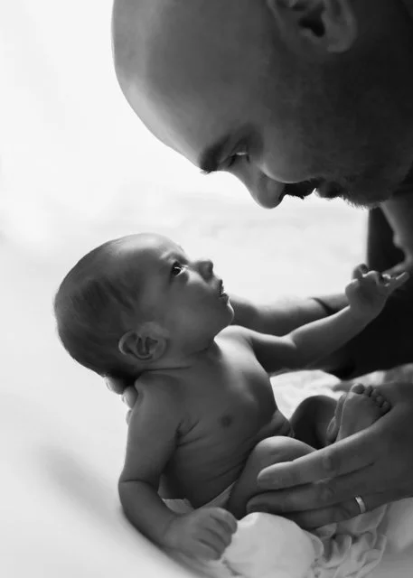 Portrait of Dad and Newborn