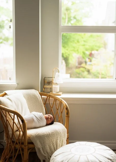 Wrapped Newborn in Nursery