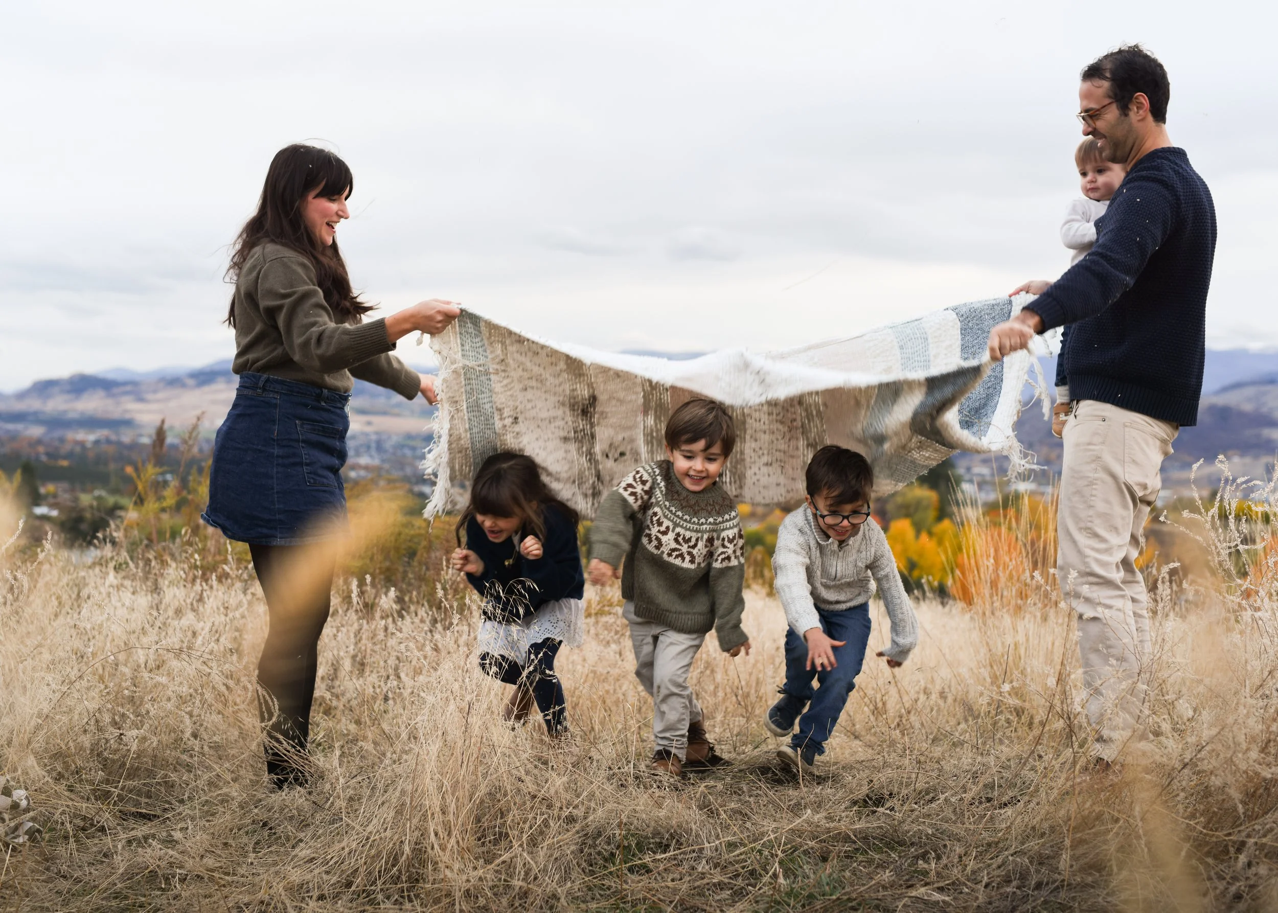 Family Laughing and Playing on Grey Canal Trail Vernon BC