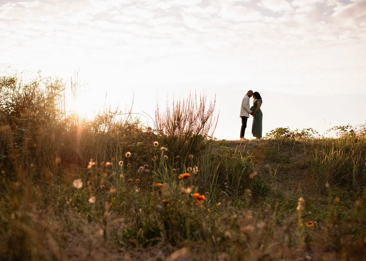 Maternity photo in the wildflowers at Iona Beach, Vancouver photography session