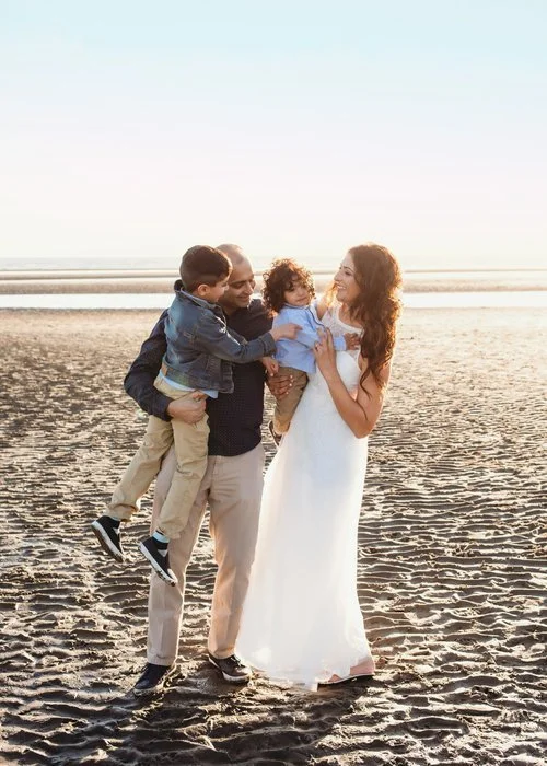 Family of 4 on Beach for Cross Border session in White Rock, BC