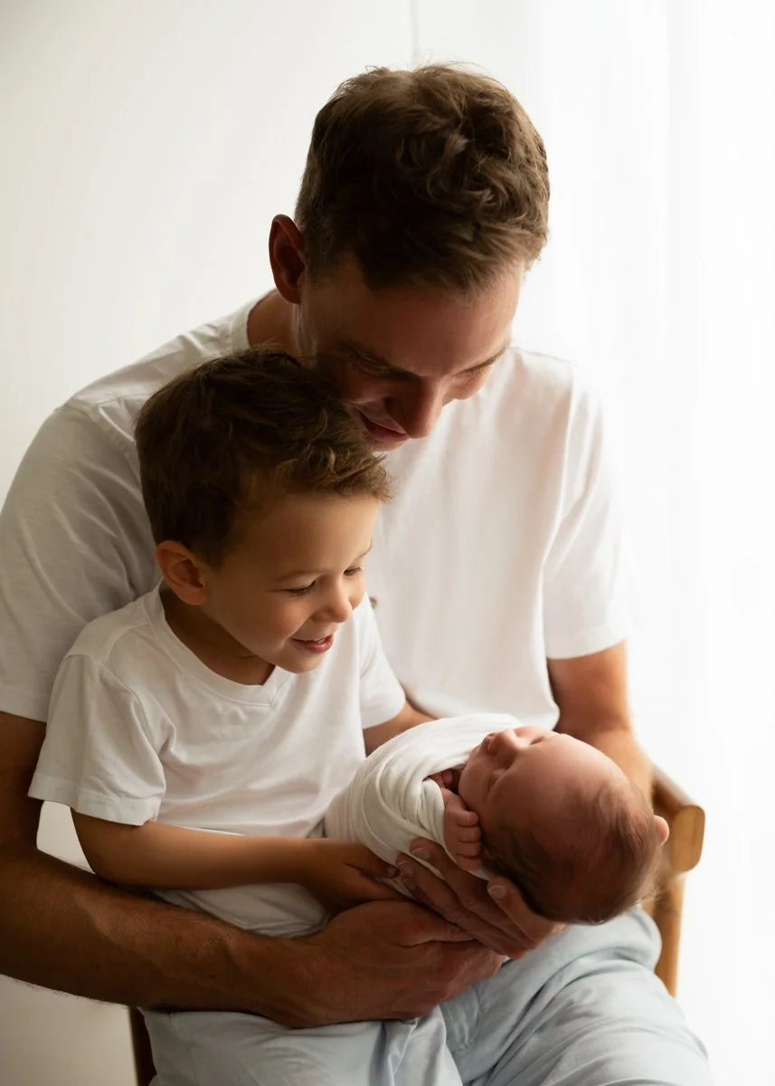 Dad son and baby, newborn photo shoot at home in Vancouver