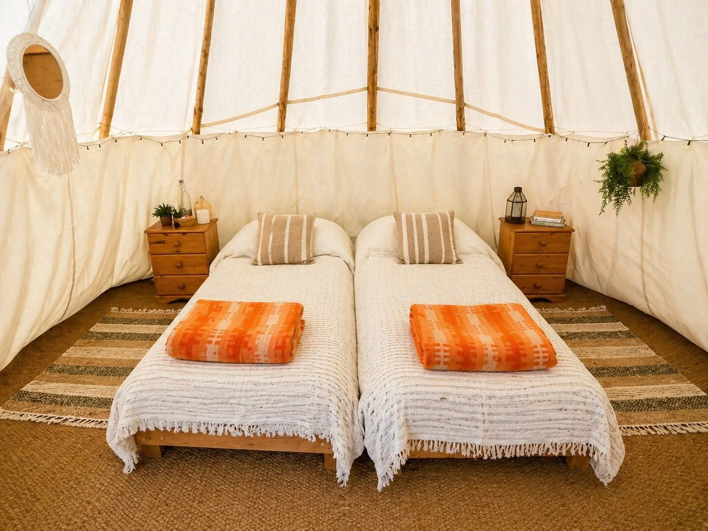 Take a look inside your tipi 👇

&ndash; Comfortable 'proper' beds
&ndash; All the little touches (even earplugs incase you have a snoring companion)
&ndash; Space to properly unwind

We are off-grid, but have everything you need for a relaxed stay.
