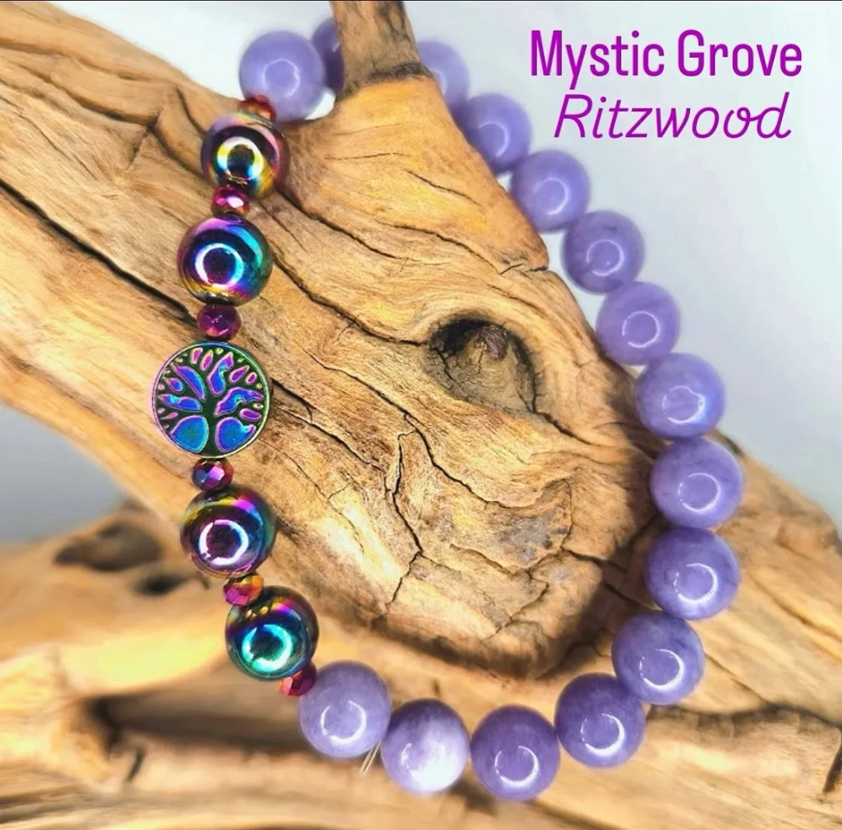Beautiful new oil slick tree of life with oil slick hematite and purple chalcedony.