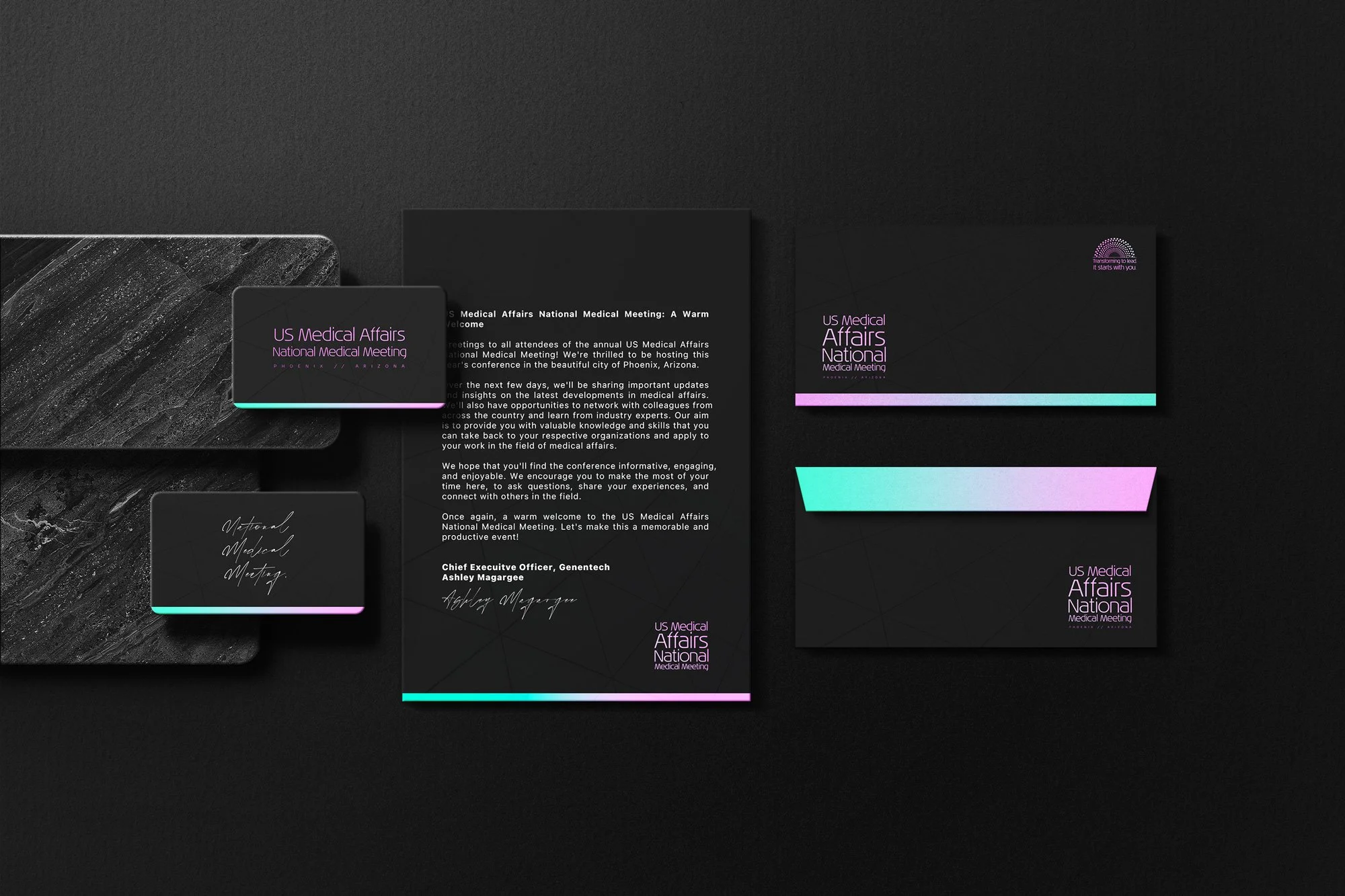 Conference branding materials, including a letter, a notebook, and two cards with black backgrounds, pink and teal accents, and the event's logo and name.